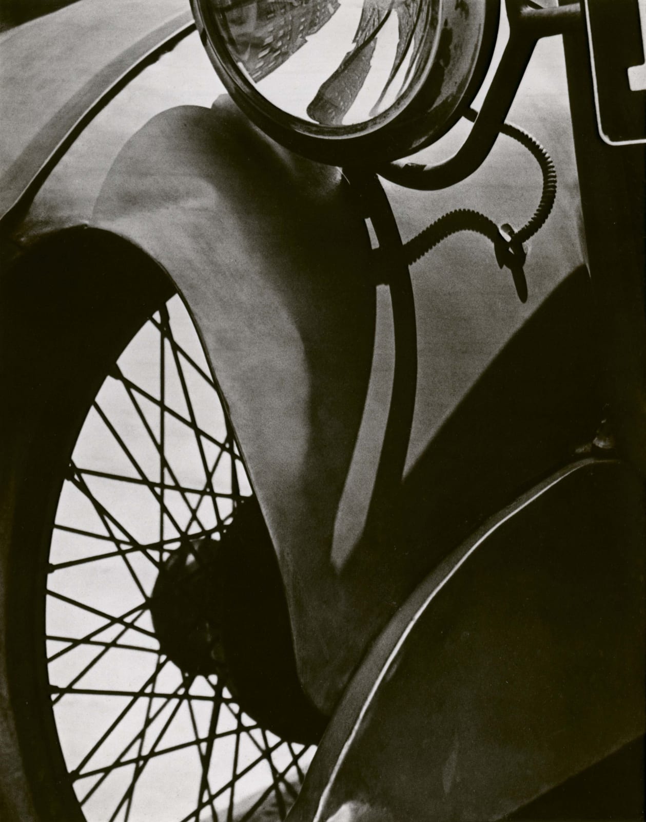 Paul Strand Wire Wheel New York abstract close up of wheel with spokes and light
