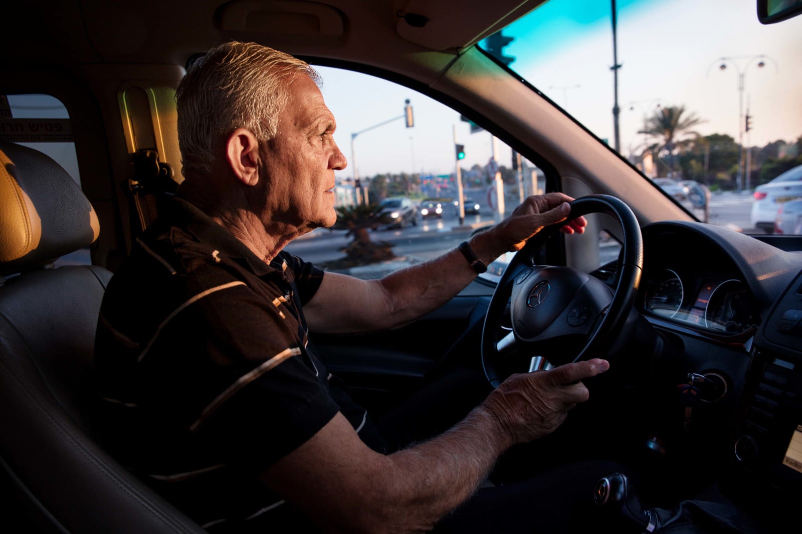 Elinor Carucci photograph of her father driving a taxi cab