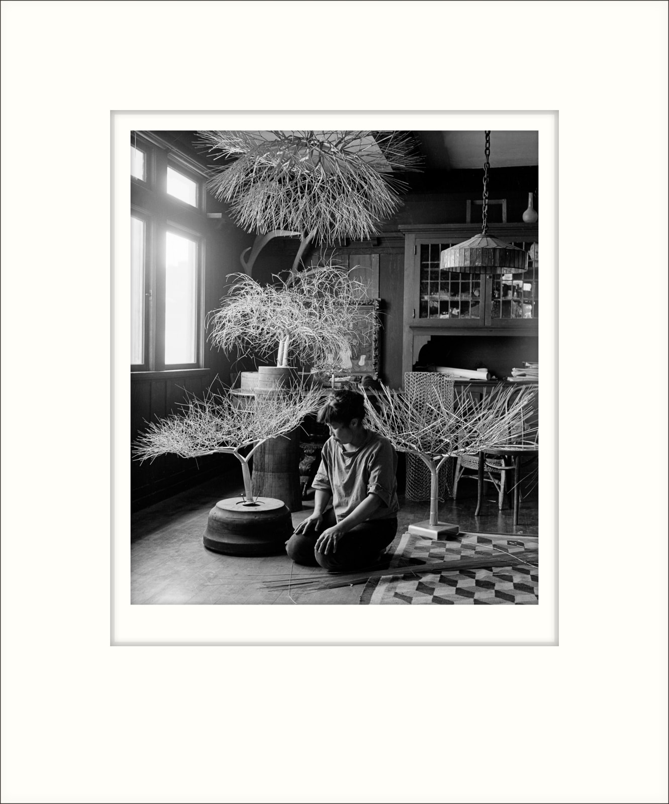 Imogen Cunningham, Ruth Asawa in Her Dining Room with Tied-Wire Sculptures, 1963