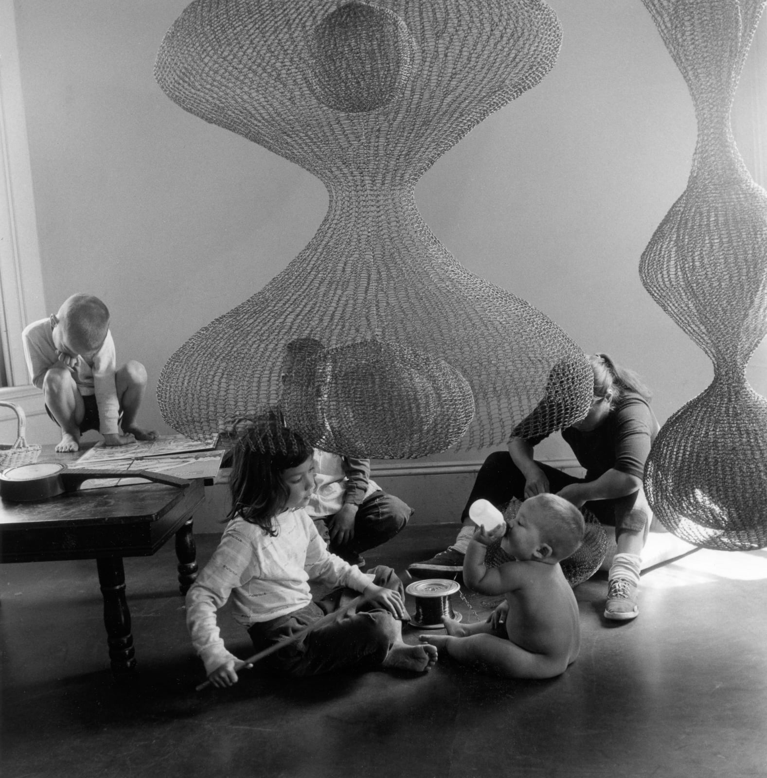 Imogen Cunningham, Ruth Asawa, Sculptor and Her Children, 1957