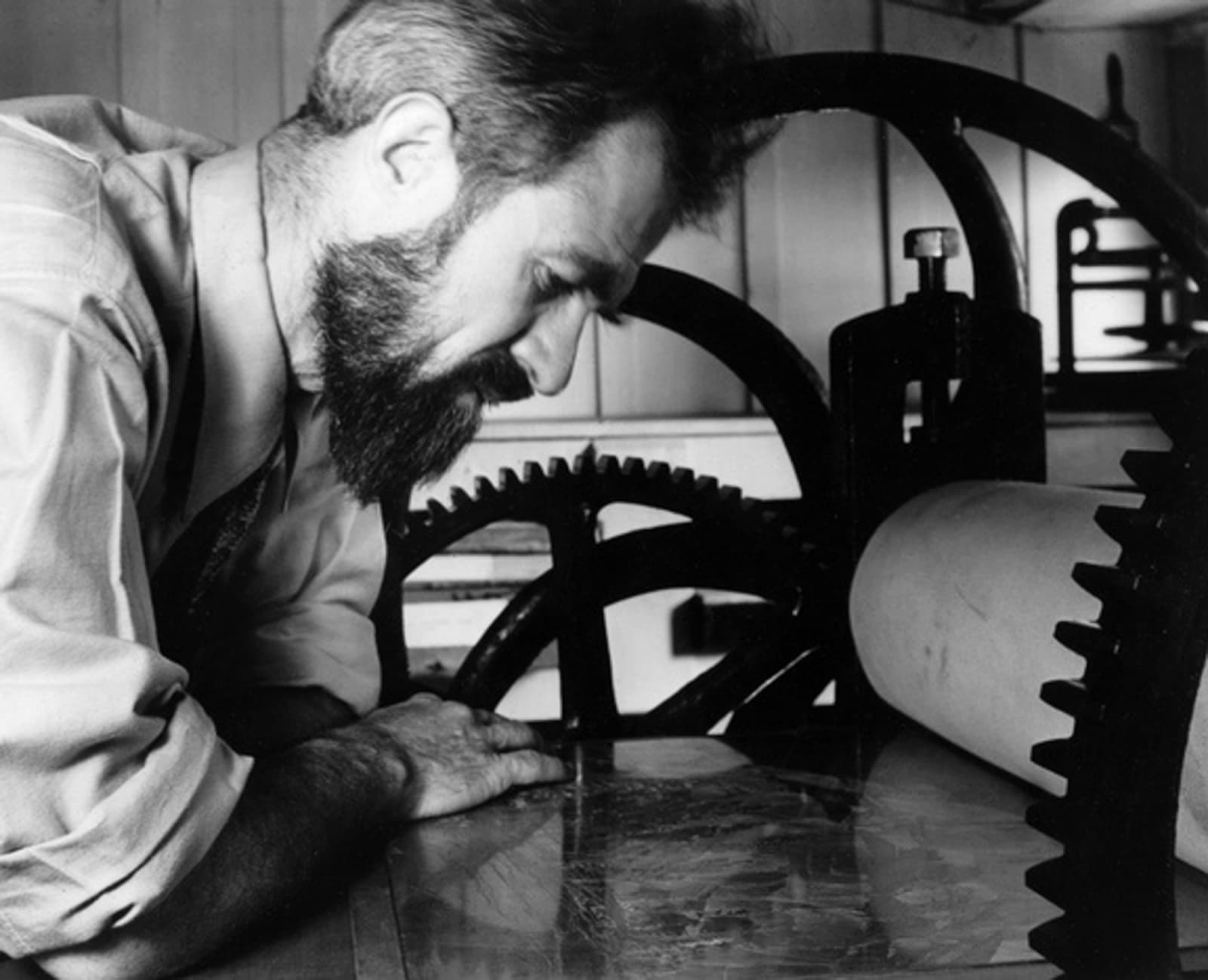 Imogen Cunningham, Roi Partridge at His Etching Press, 1928