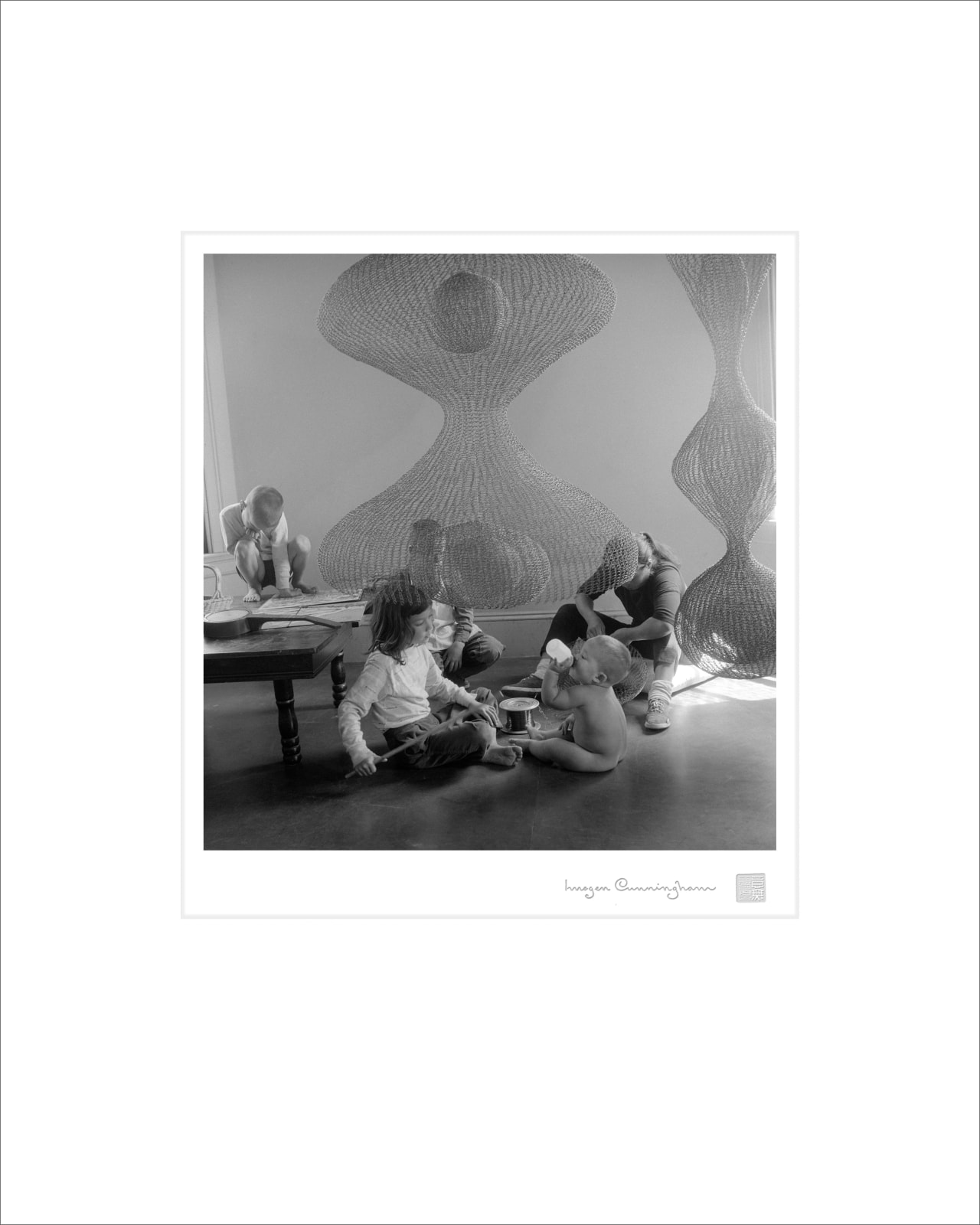 Imogen Cunningham, Ruth Asawa, Sculptor and Her Children, 1957