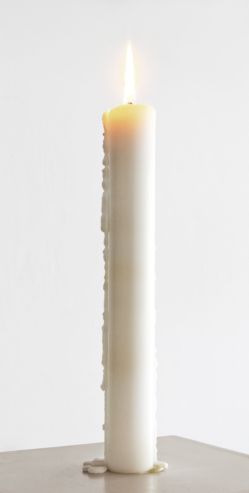 Katie Paterson Candle (from Earth into a Black Hole), 2015 Scented candle, 23 layers, Parafin wax, wick, fragrance edition of 45 plus 2 AP This edition 16/45 29 x 3 x 3 cm (candle) 38.2 x 20.7 x 5.2 cm (Boxed)