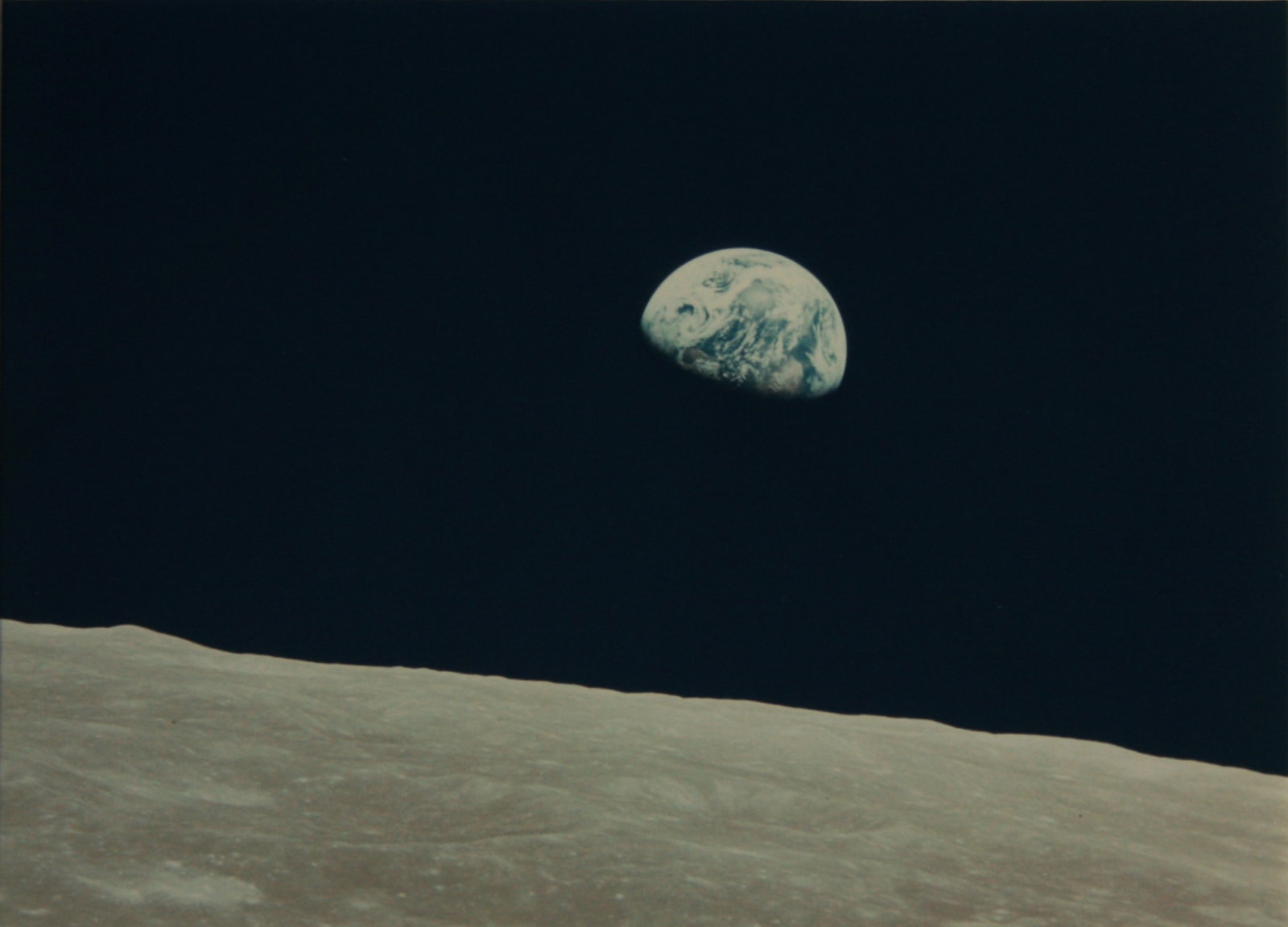 NASA (Crew of Apollo 8 - Bill Anders) Earthrise, 24 December 1968 vintage chromogenic print published by NASA 18 x 24 cm (image)38 x 43.5 cm (framed)