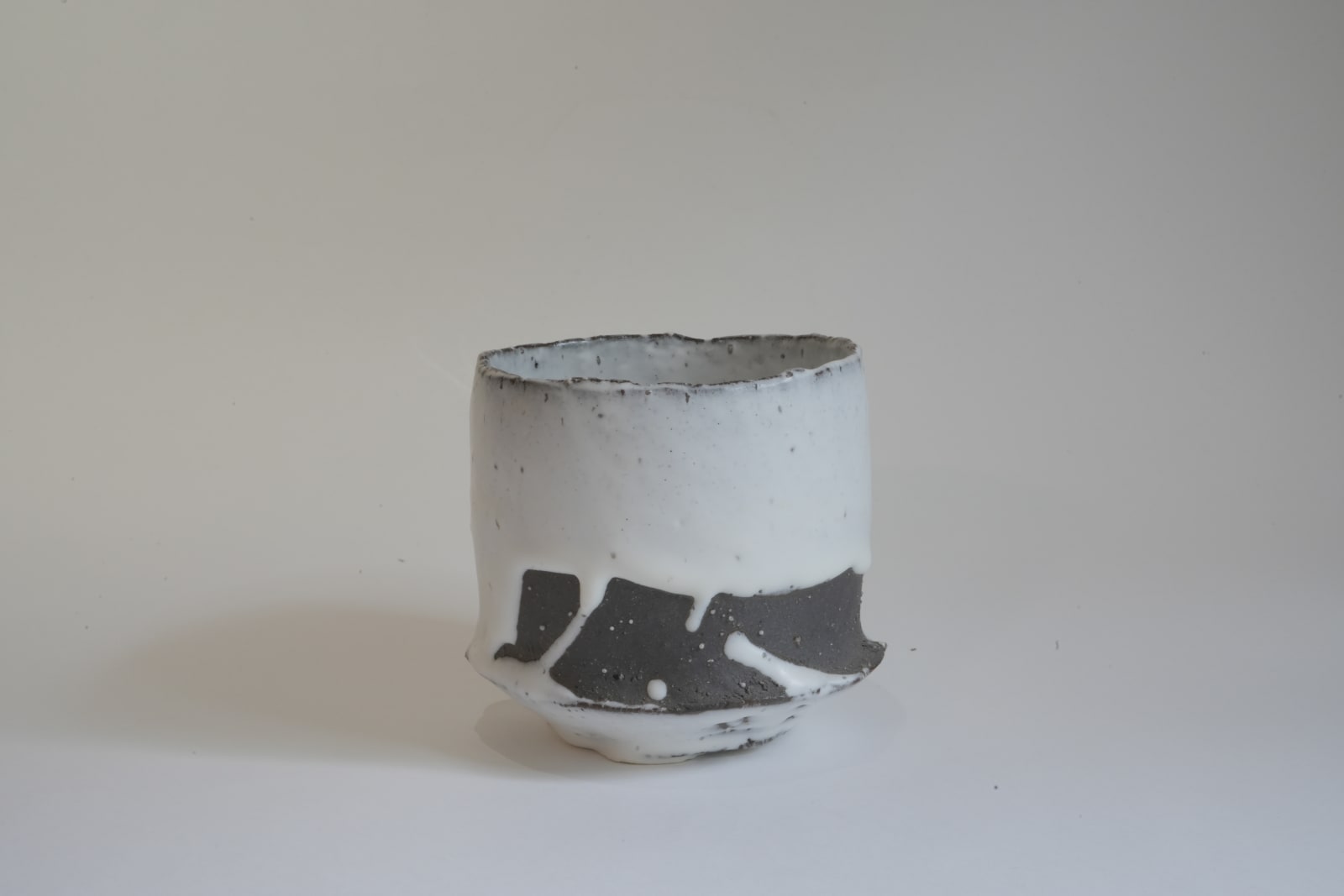 Hiromi Itabashi, Black Clay White Glaze Tubular Tea Bowl 黒土白釉筒茶碗, 1991