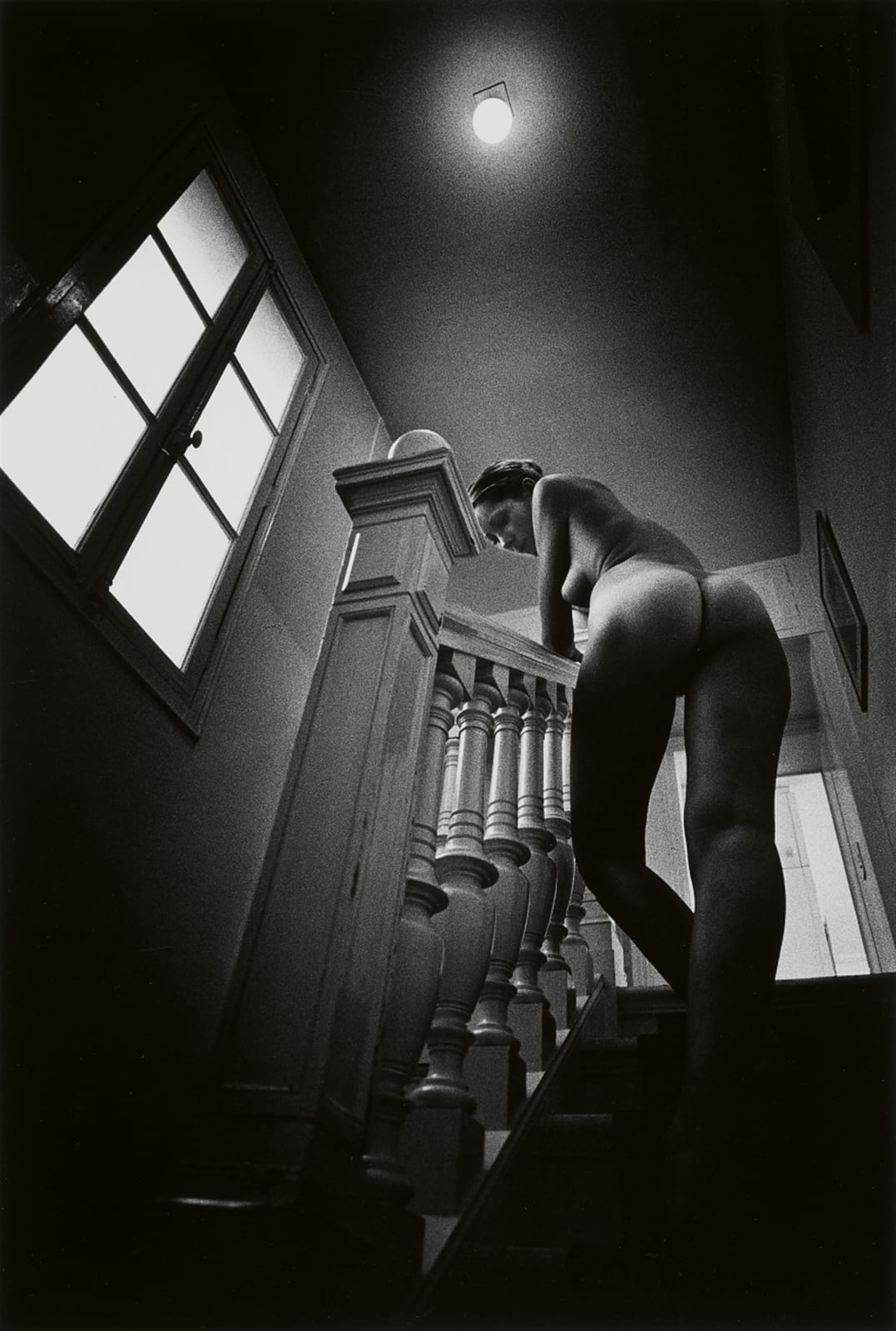 Jeanloup Sieff, Young woman descending stairs, Paris, 1972