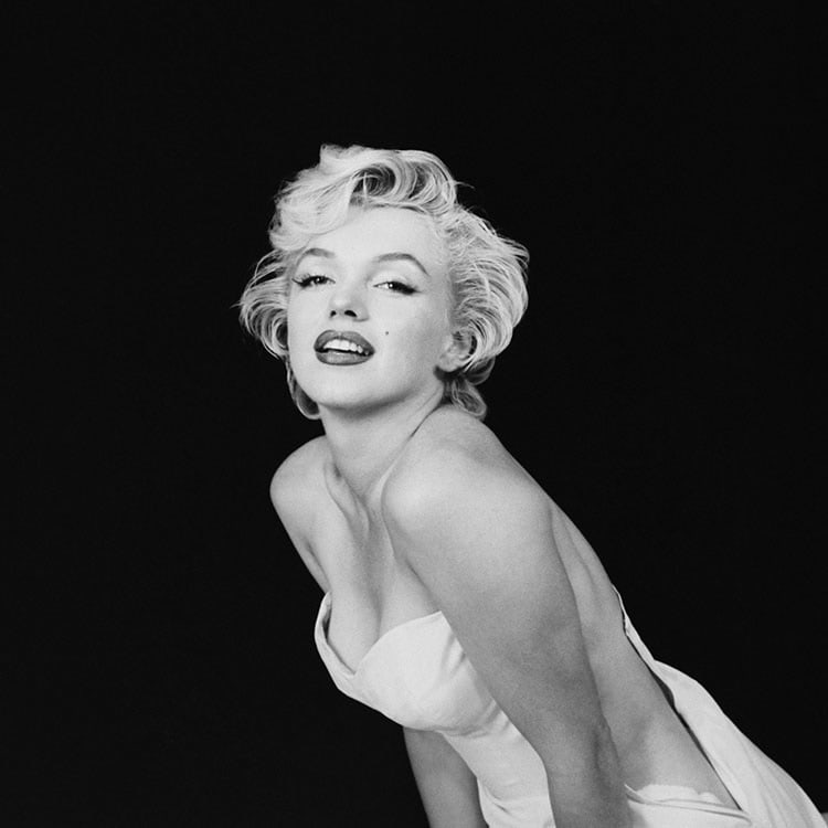 Milton H. Greene, Marilyn Monroe poses in a tulle and satin dress by Herbert Kasper, New York, October, 1954