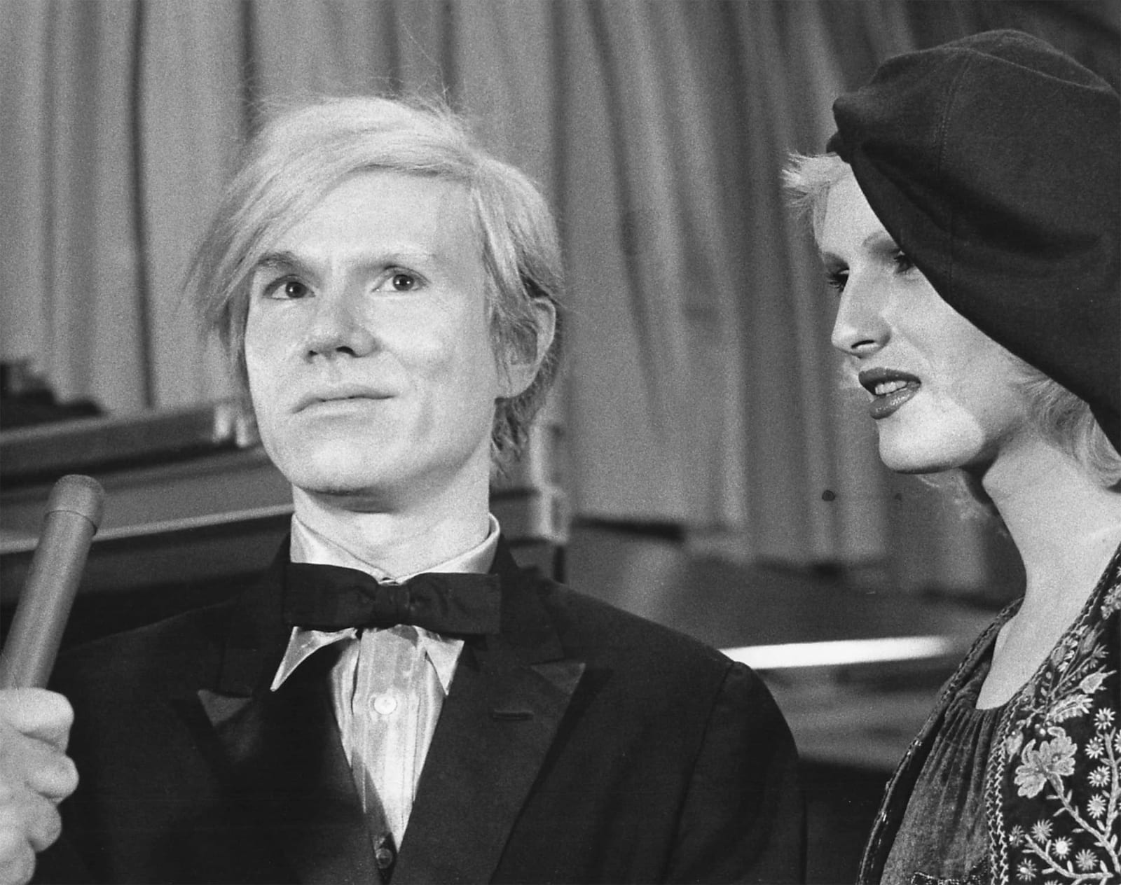 Ron Galella, Andy Warhol and Candy Darling at the film-world premiere of "Fidler on the Roof", Rivoli Theatre, New York City, NY, November 3, 1971