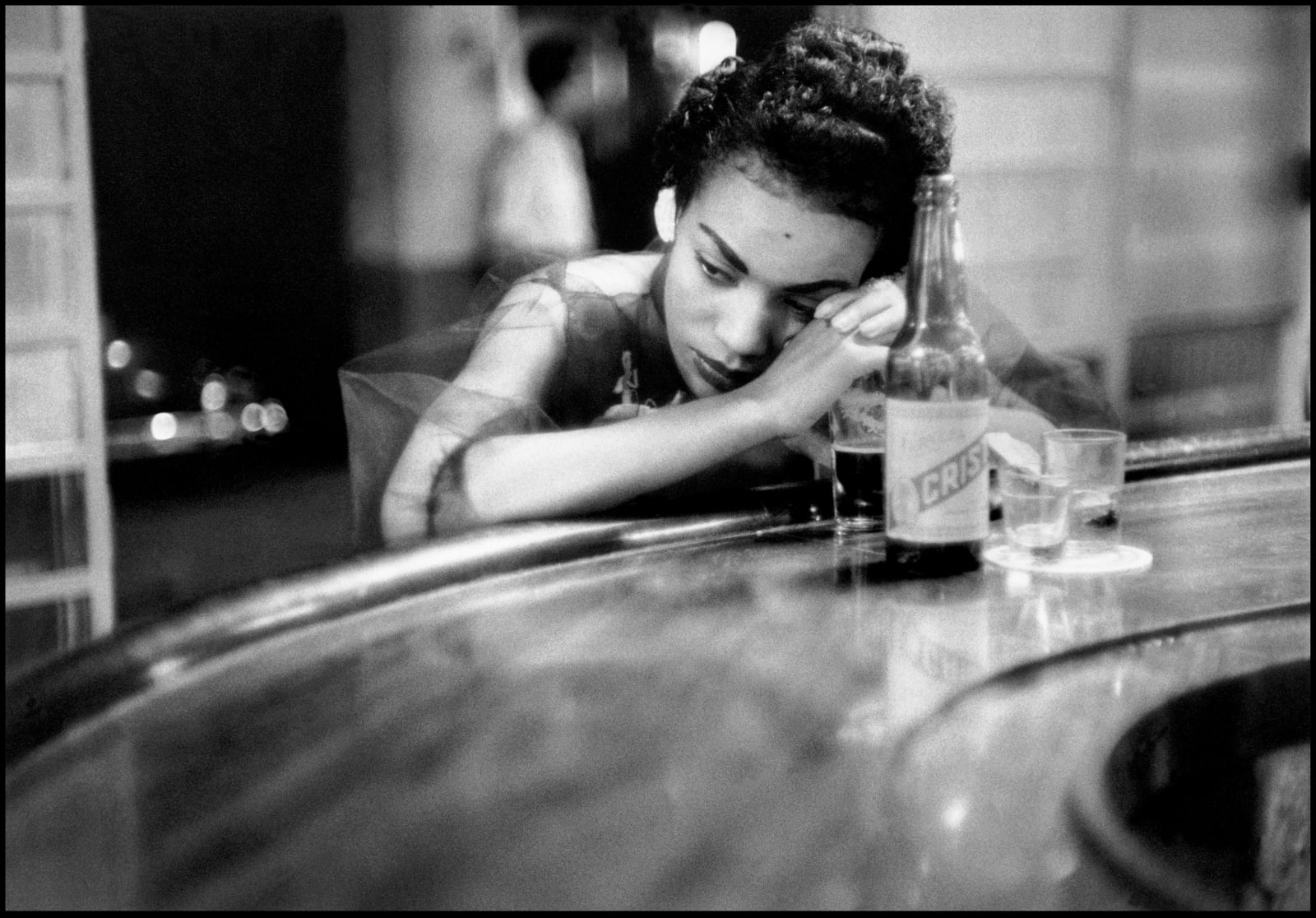 Eve Arnold, Bar girl in a brothel in the red light district in Havana, Cuba, 1954