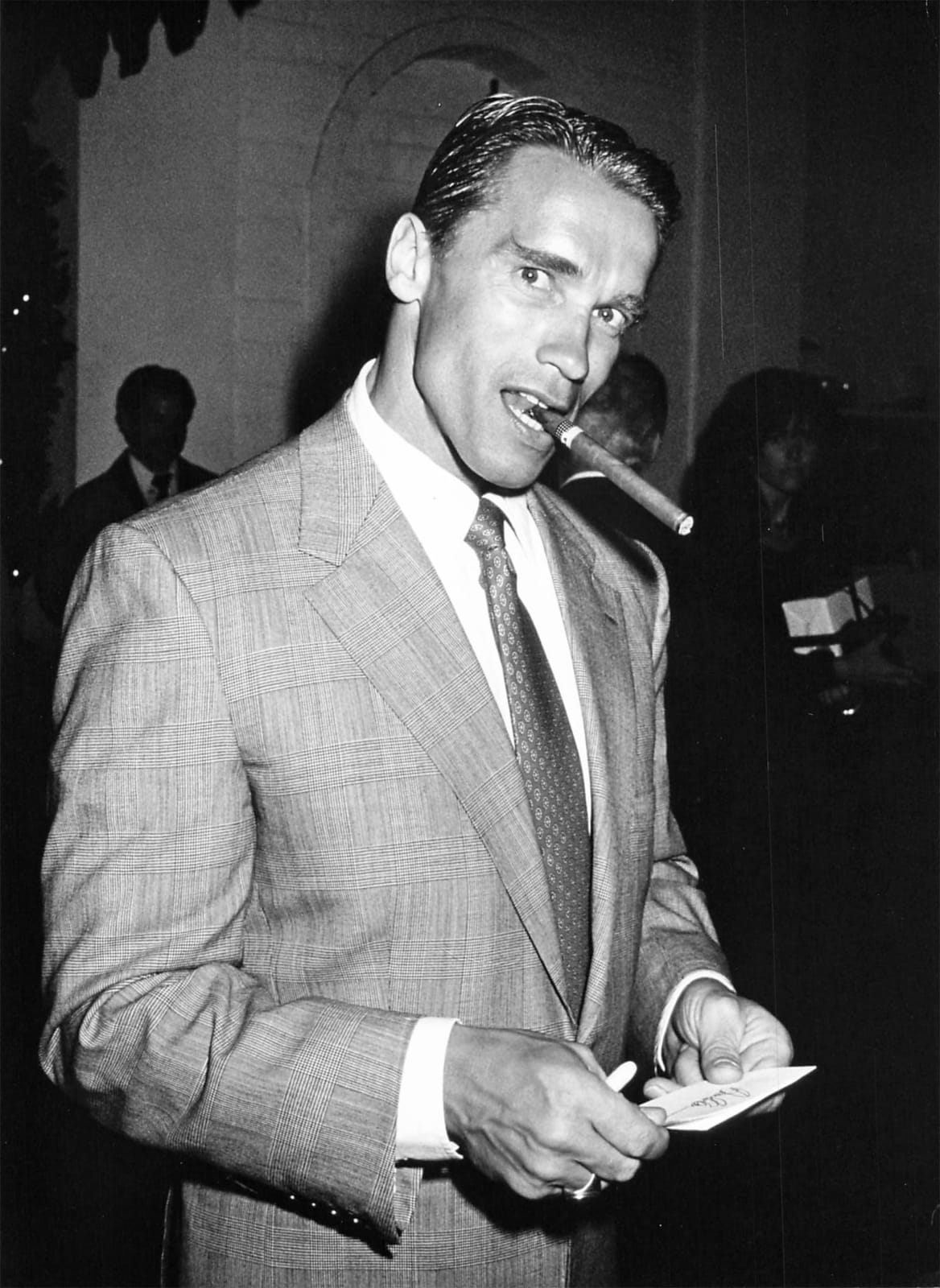 Ron Galella, Arnold Schwarzenegger at a pre-Oscar bash at Chasen's in Beverly Hills, California, April 9, 1988