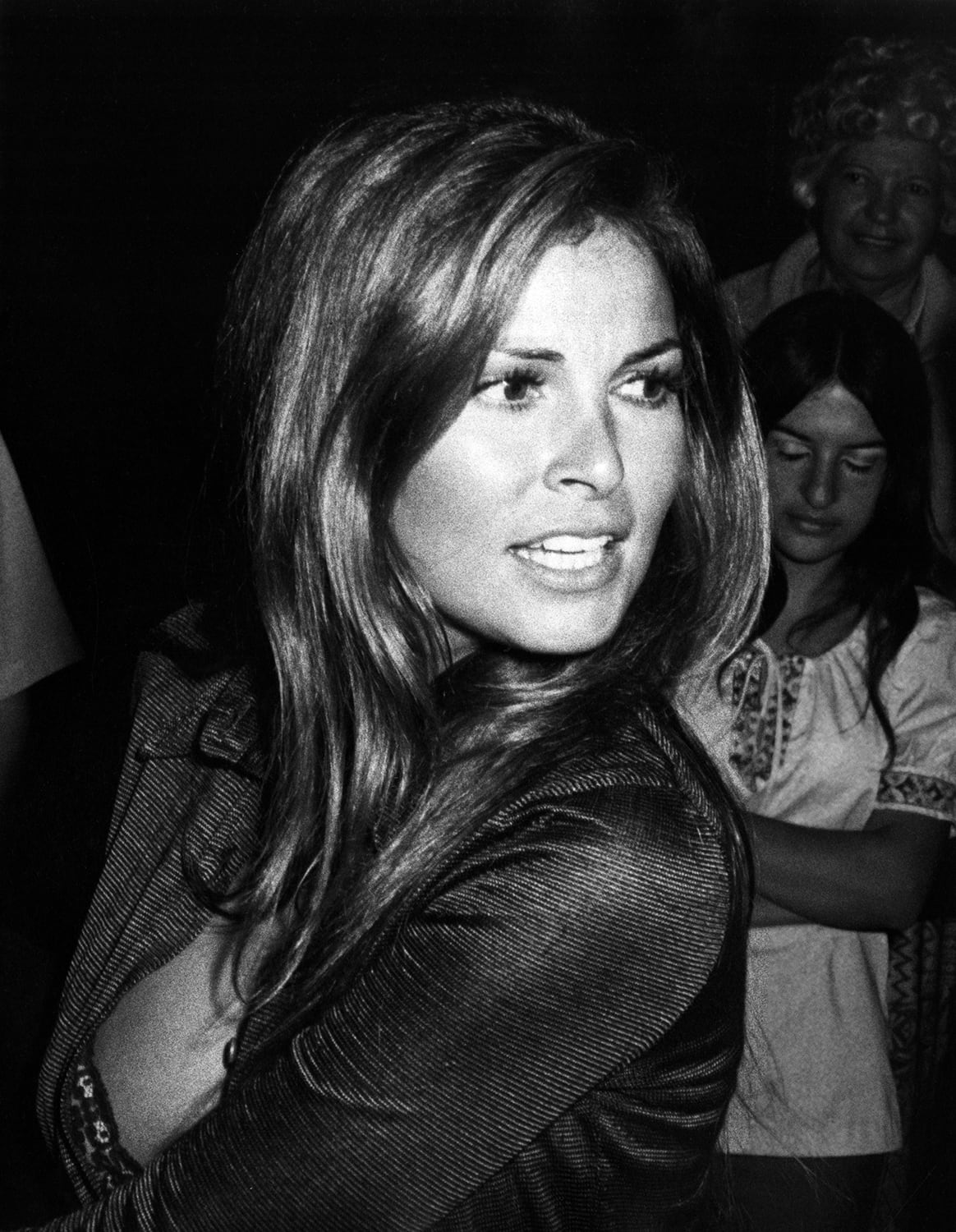 Ron Galella, Raquel Welch attends Polly Bergen Party at Bergen's home, Beverly Hills, California, June 12, 1971