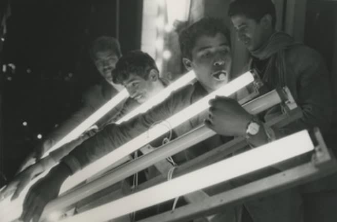 Sergio Larrain, Untitled (Boys carrying lights)