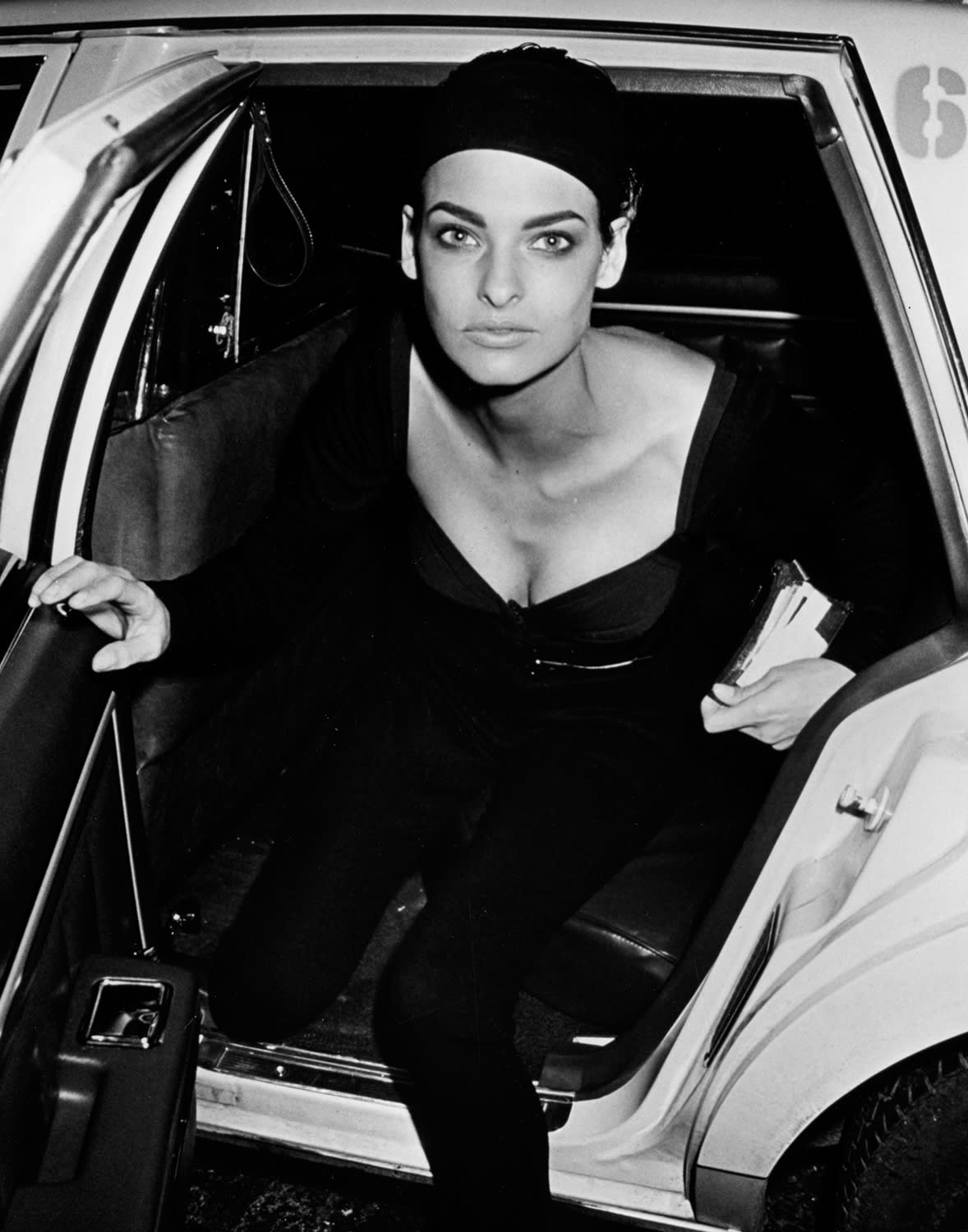 Ron Galella, Linda Evangelista sighted departing a car at 150 Wooster Street, April 2, 1990