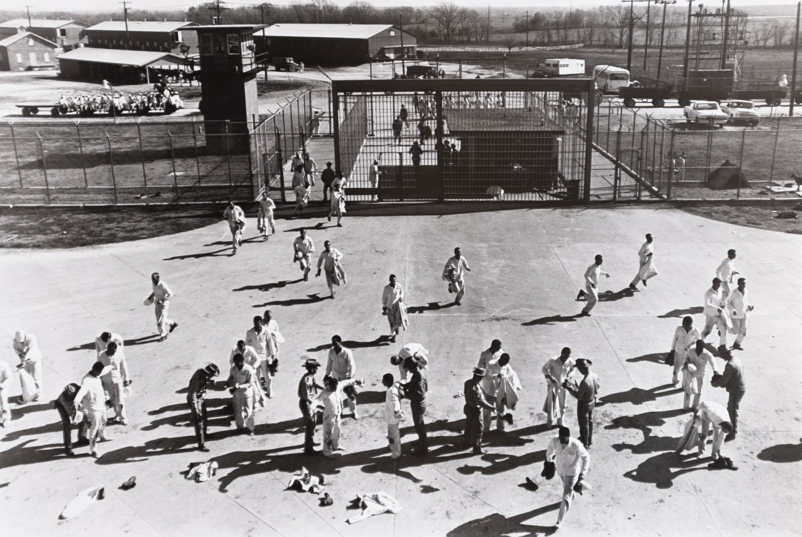 Danny Lyon, Prison Series (Inmates being Searched In Prison Yard), 1968