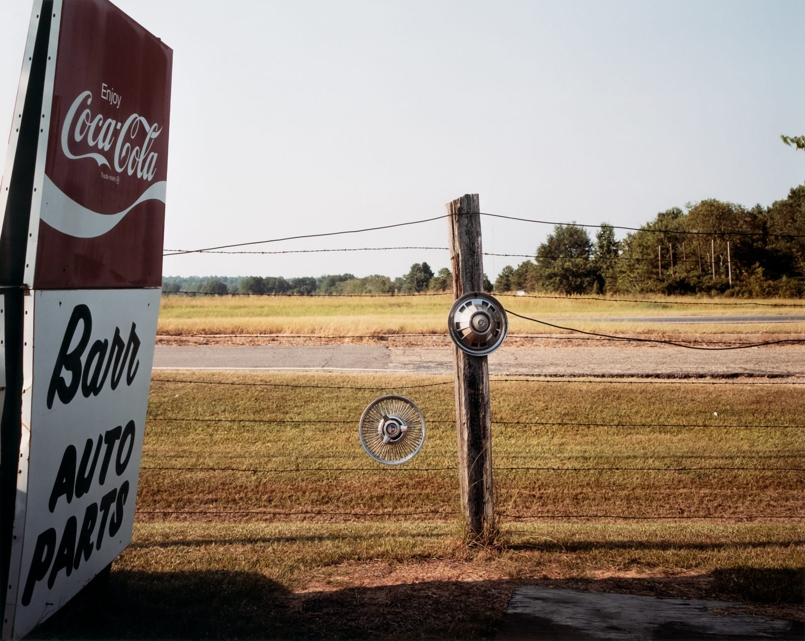 William Christenberry, Signs and Hubcaps, near Tuscaloosa, Alabama, 1990