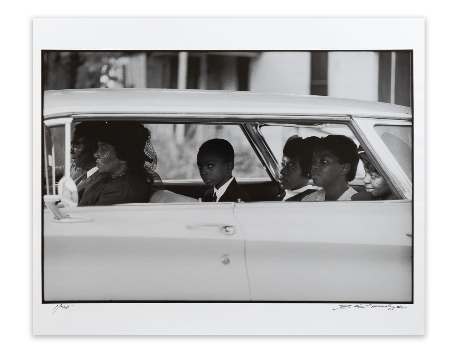 William Eppridge, The Chaney family as they depart for the burial of James Chaney, Meridian, Mississippi, August 7, 1964