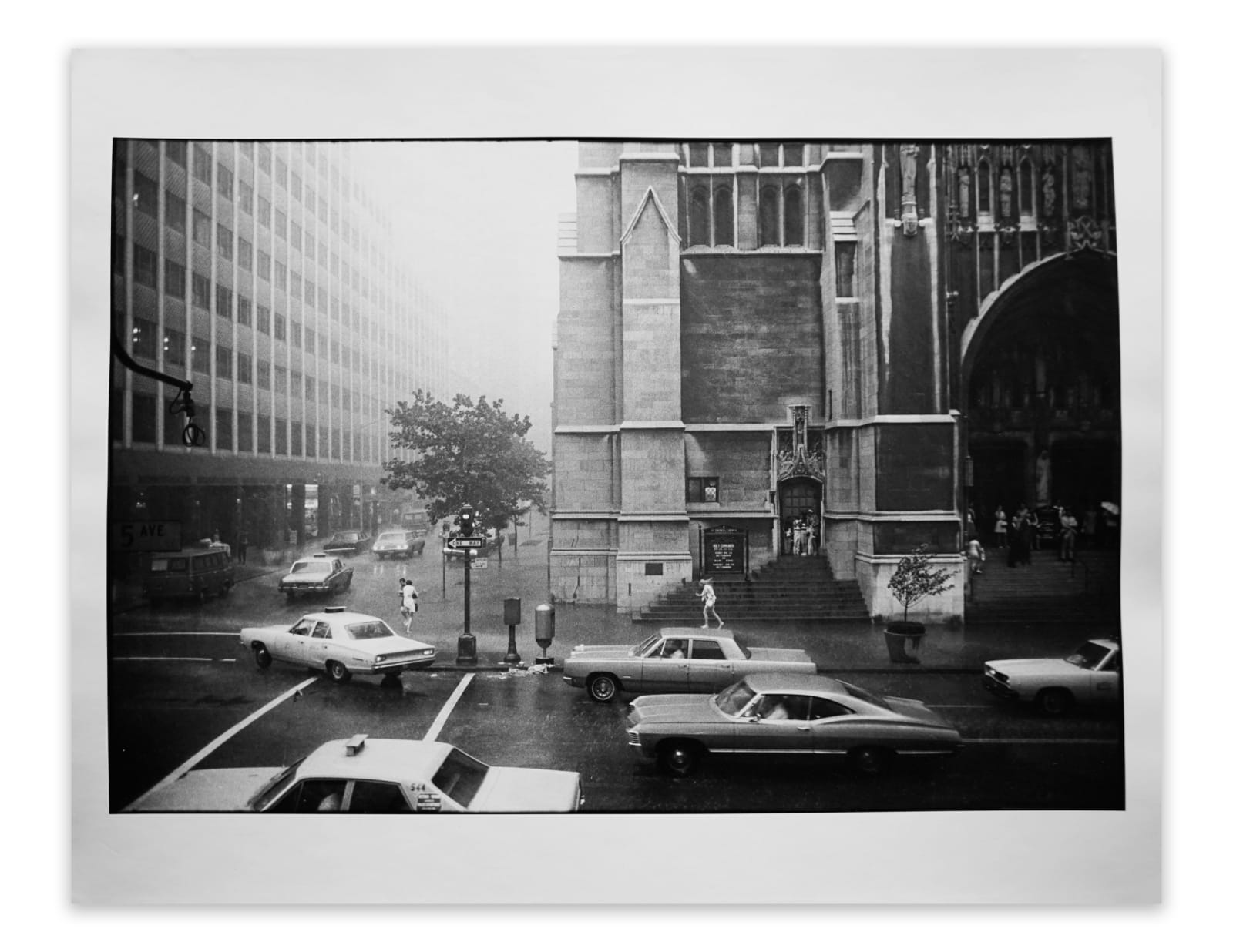 Garry Winogrand, 5th Avenue and 54th St. In the Rain, New York, 1968