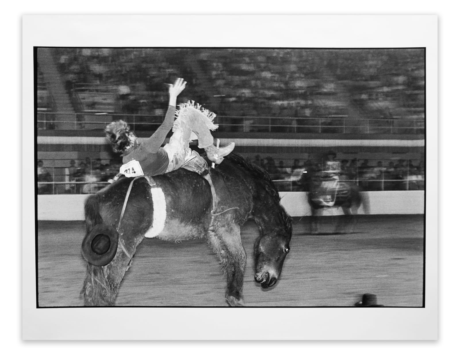 Garry Winogrand, Cowboy, Hat on Edge of Frame, Rodeo, 1974