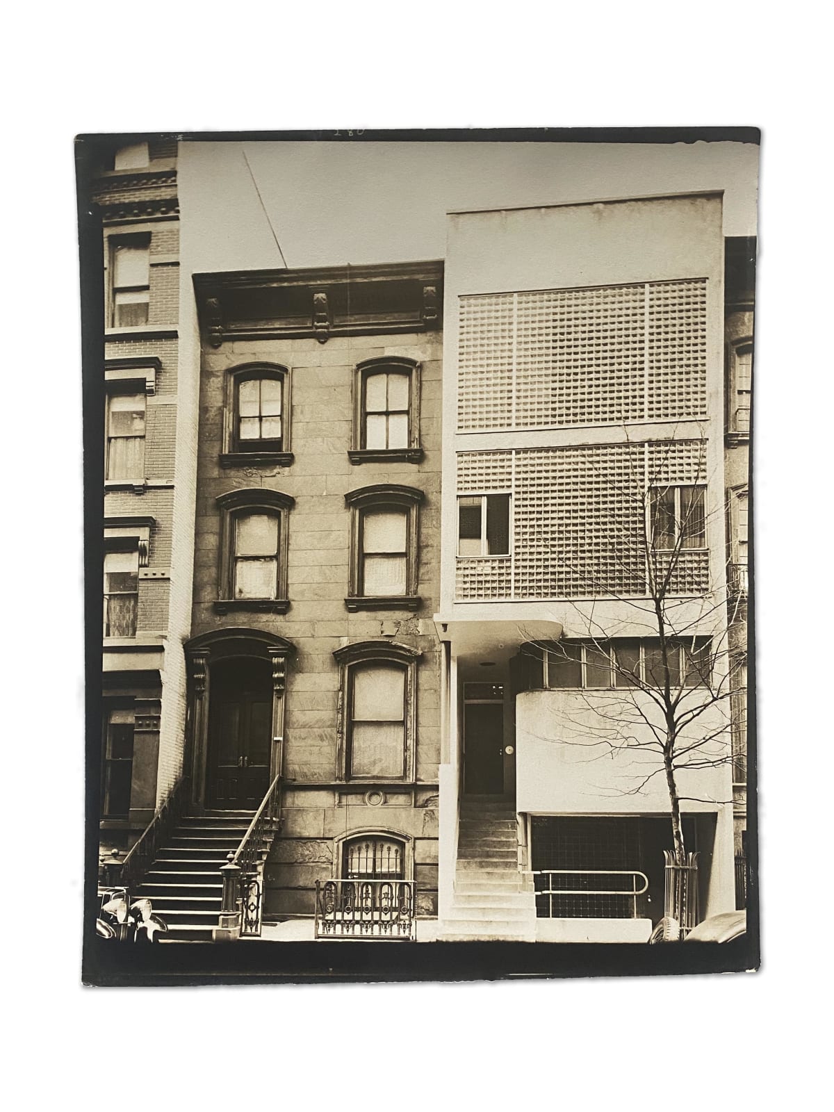 Berenice Abbott, MIDDLE EAST SIDE: Glass-Brick and Brownstone Fronts, 211 and 209 East 48th Street, Manhattan, February 1, 1938