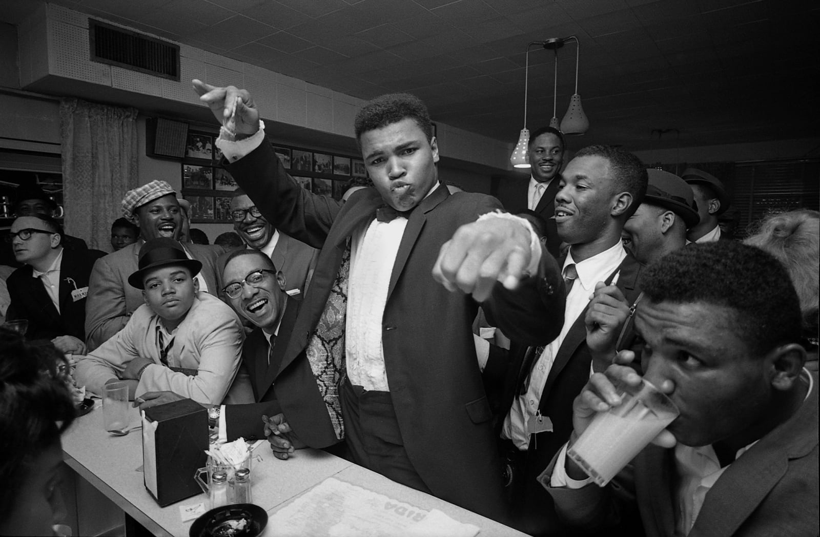 Bob Gomel, Cassius Clay (Muhammad Ali) victory party after he defeated Sonny Liston for the Heavyweight Championship, February, 1964