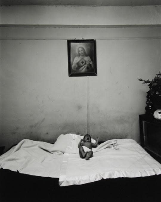 Bruce Davidson, Untitled, East 100th Street (Crying Baby and Portrait of Christ), 1966 - 68