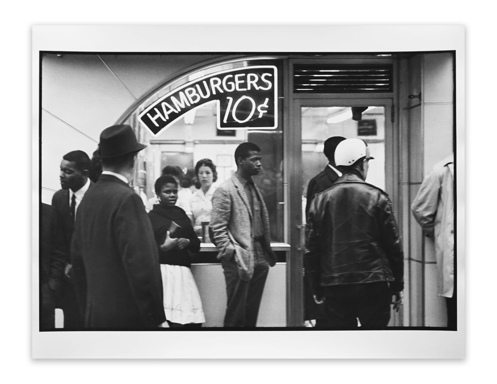 Danny Lyon, Civil Rights Series, Nashville, November 1962, the Annual SNCC Conference: Outside Tic Toc Hamburger Place, Lester MacKinney, Bernice Reagon and John O'Neal wait to get in, 1962