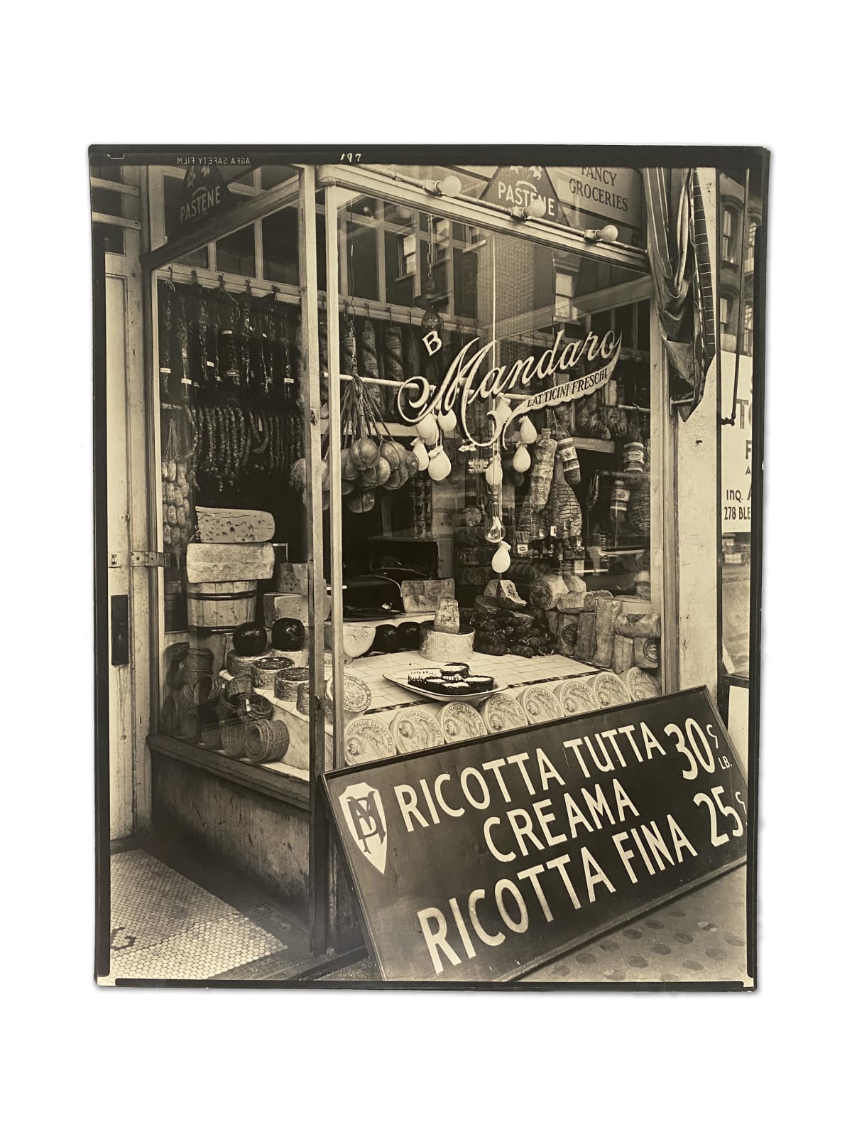Berenice Abbott, GREENWICH VILLAGE: Cheese Store, 276 Bleecker Street, Manhattan, February 2, 1937