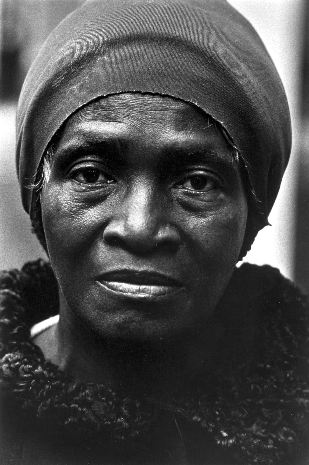 Louis Stettner, Black Woman, Rockefeller Center, 1974