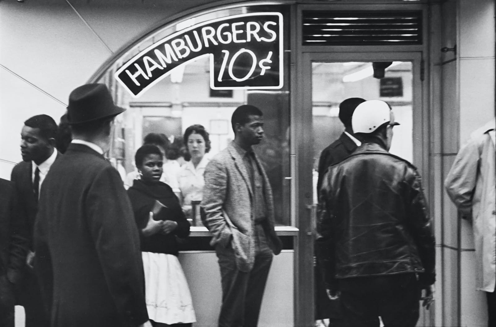 Danny Lyon, Civil Rights Series, Nashville, November 1962, the Annual SNCC Conference: Outside Tic Toc Hamburger Place, Lester MacKinney, Bernice Reagon and John O'Neal wait to get in, 1962