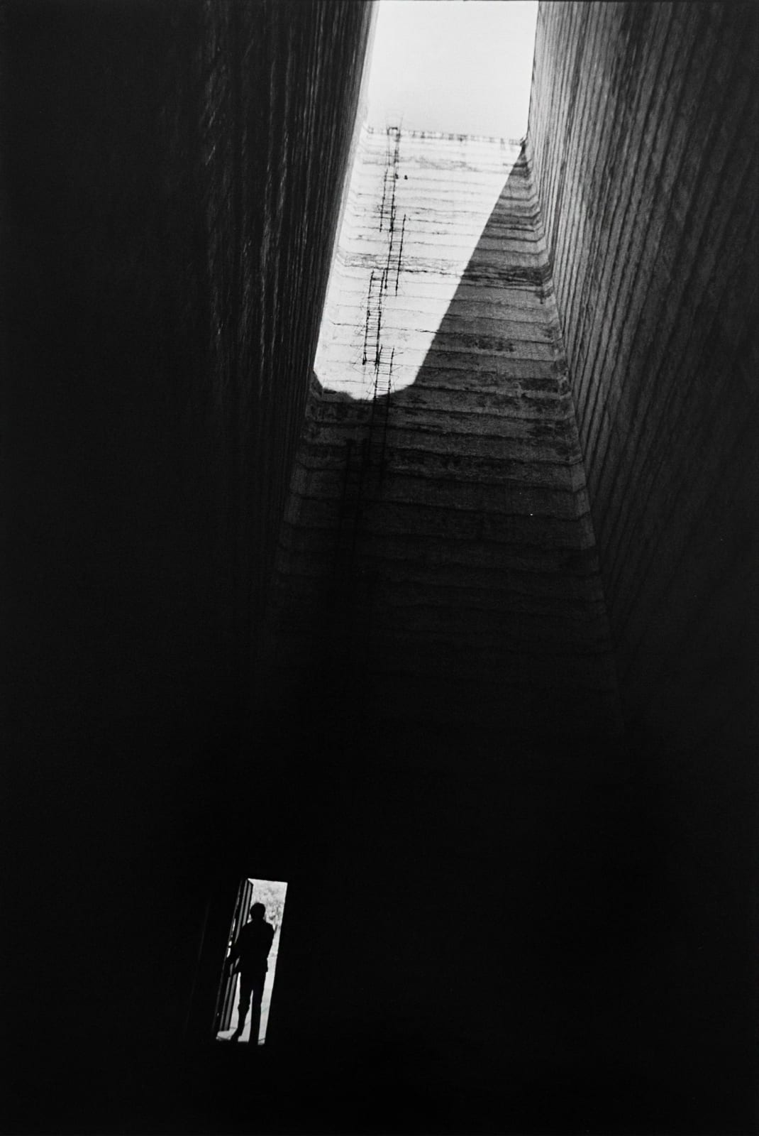 Rene Burri, Luis Barragán at the entrance of the Satellite City Towers, Mexico City, 1974