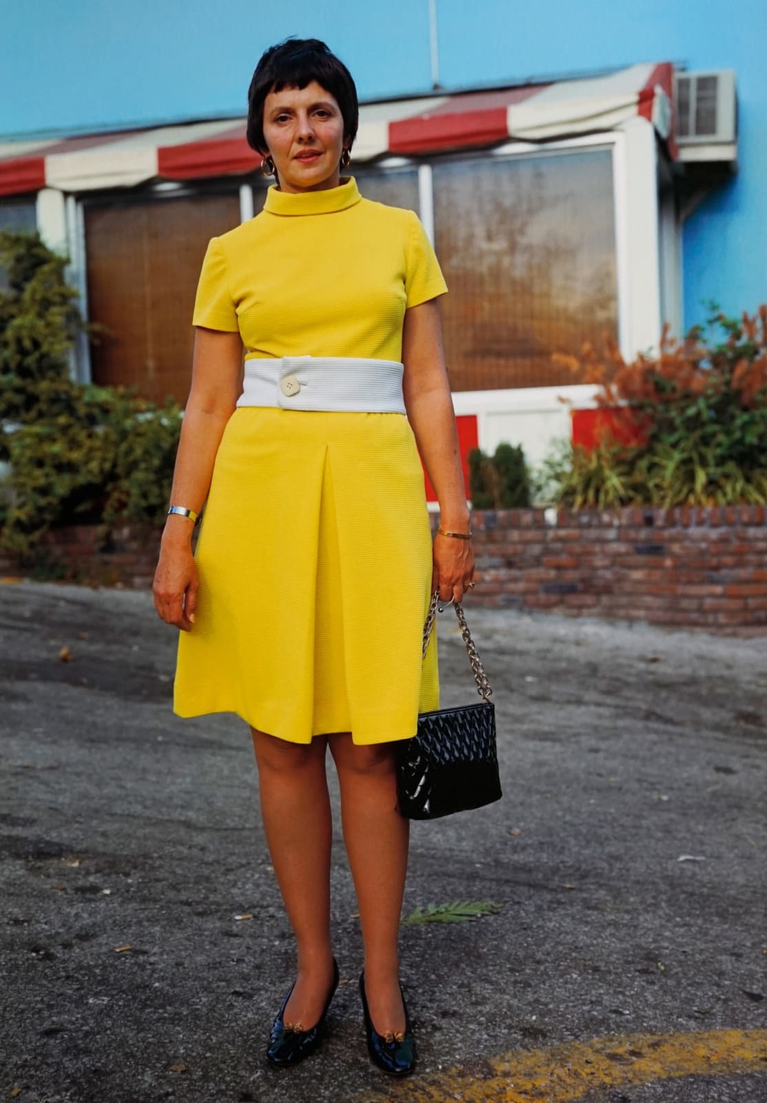 William Eggleston, Untitled (woman in yellow dress), 1973
