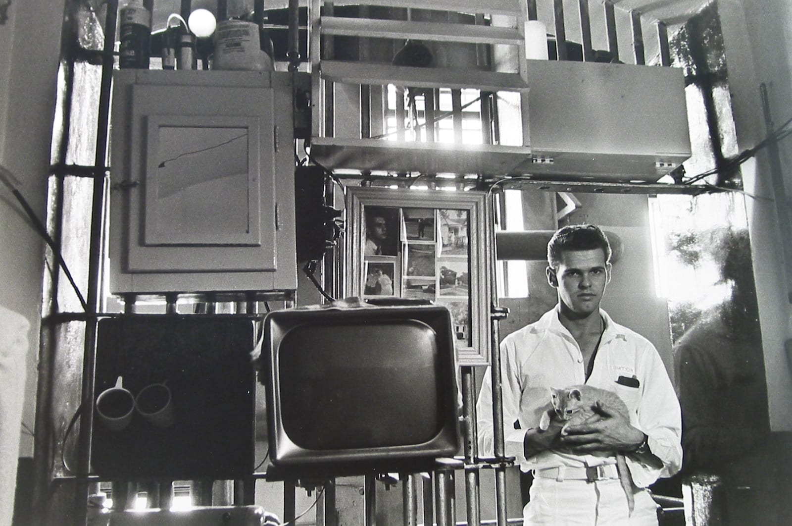 Danny Lyon, Prisoner Holding Kitten, 1968
