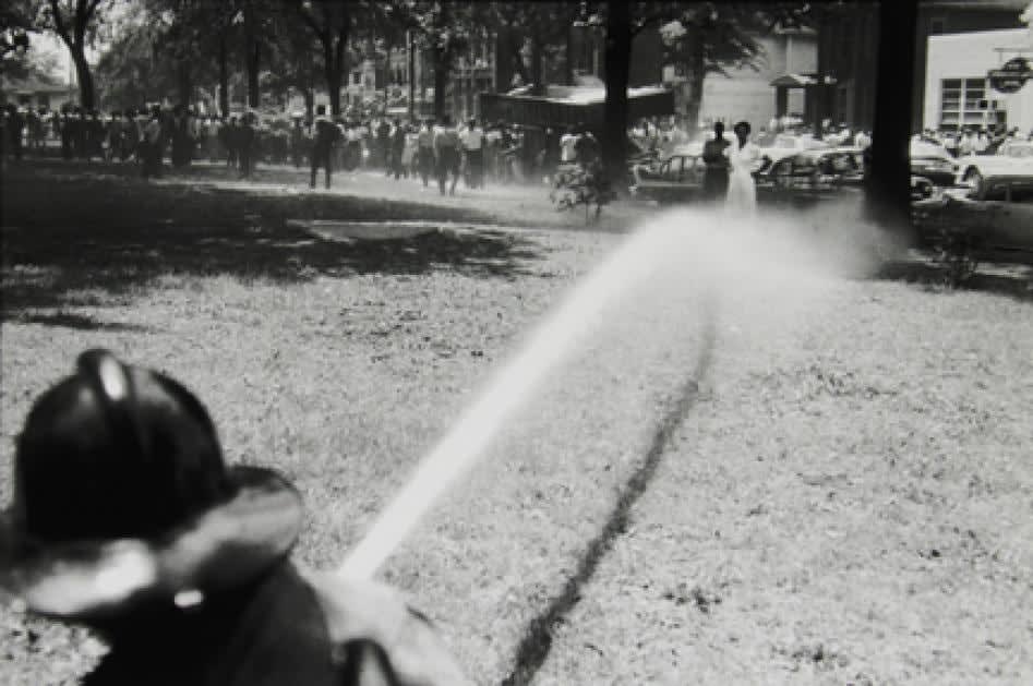 Bruce Davidson, Untitled, Time of Change (Fireman Aims Hose, Birmingham, Alabama), 1963