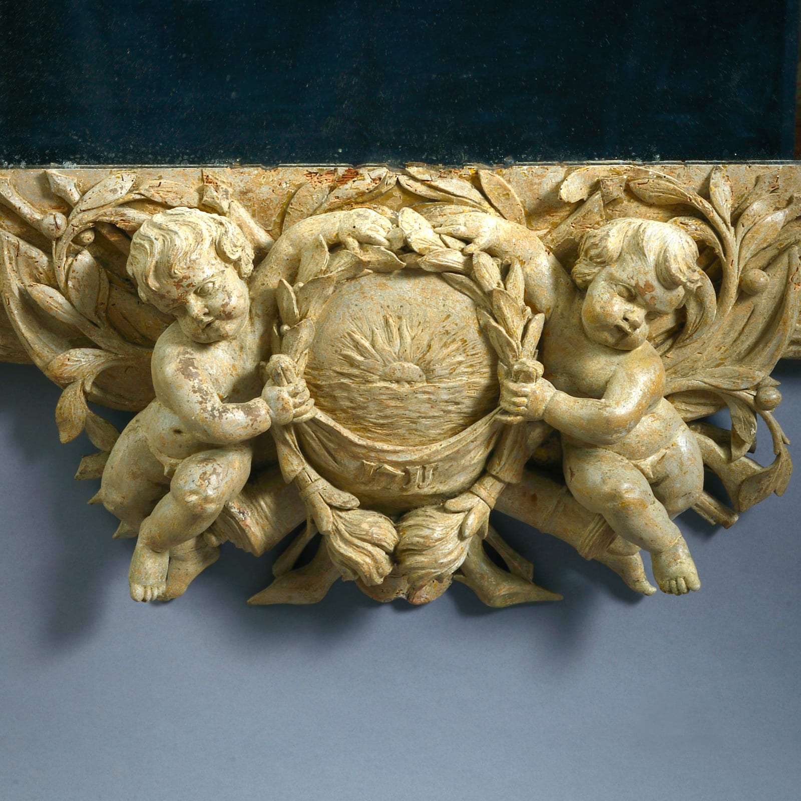 DUTCH BAROQUE STONE-PAINTED CARVED LIMEWOOD MIRROR