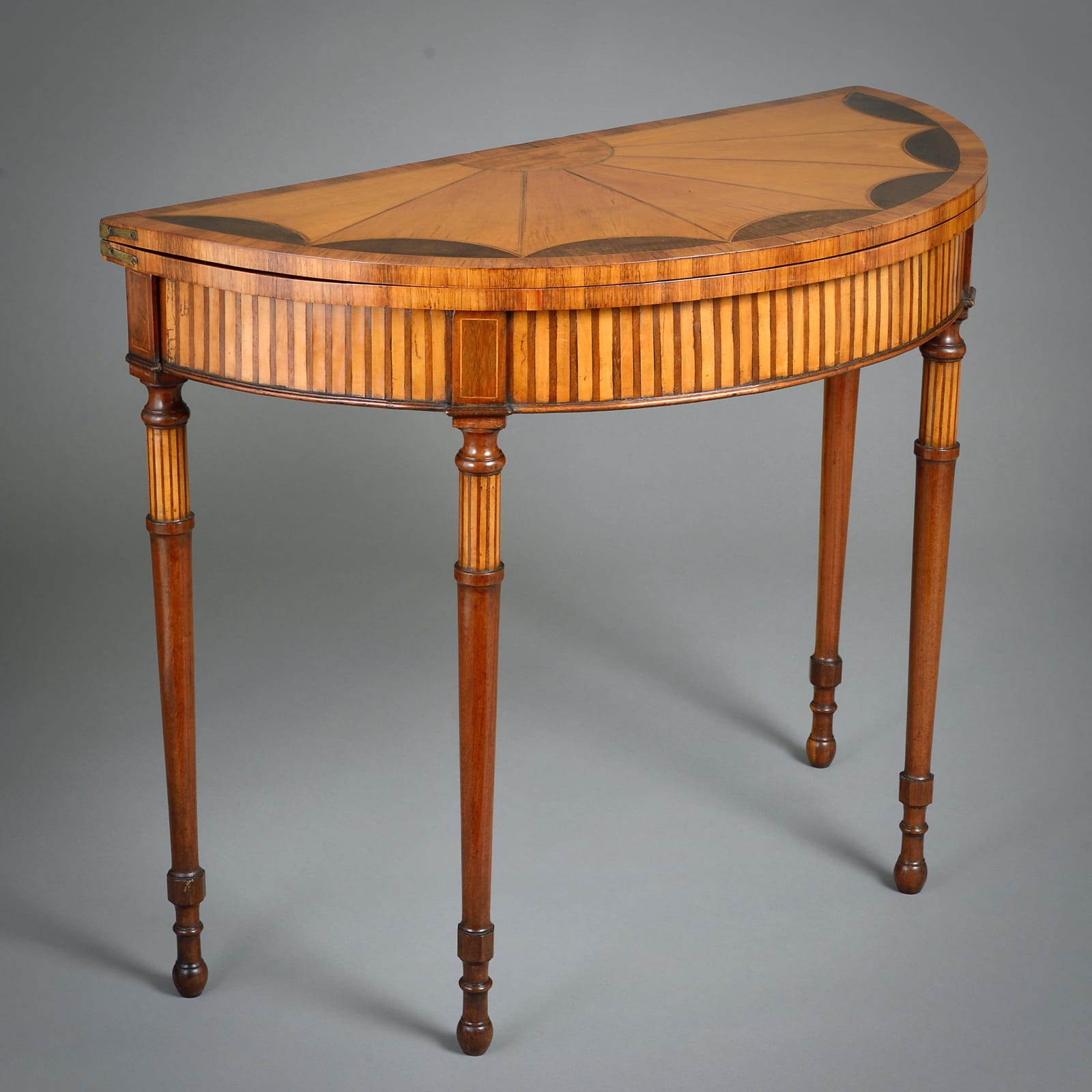 GEORGE III SATINWOOD AND MAHOGANY DEMI-LUNE CARD TABLE