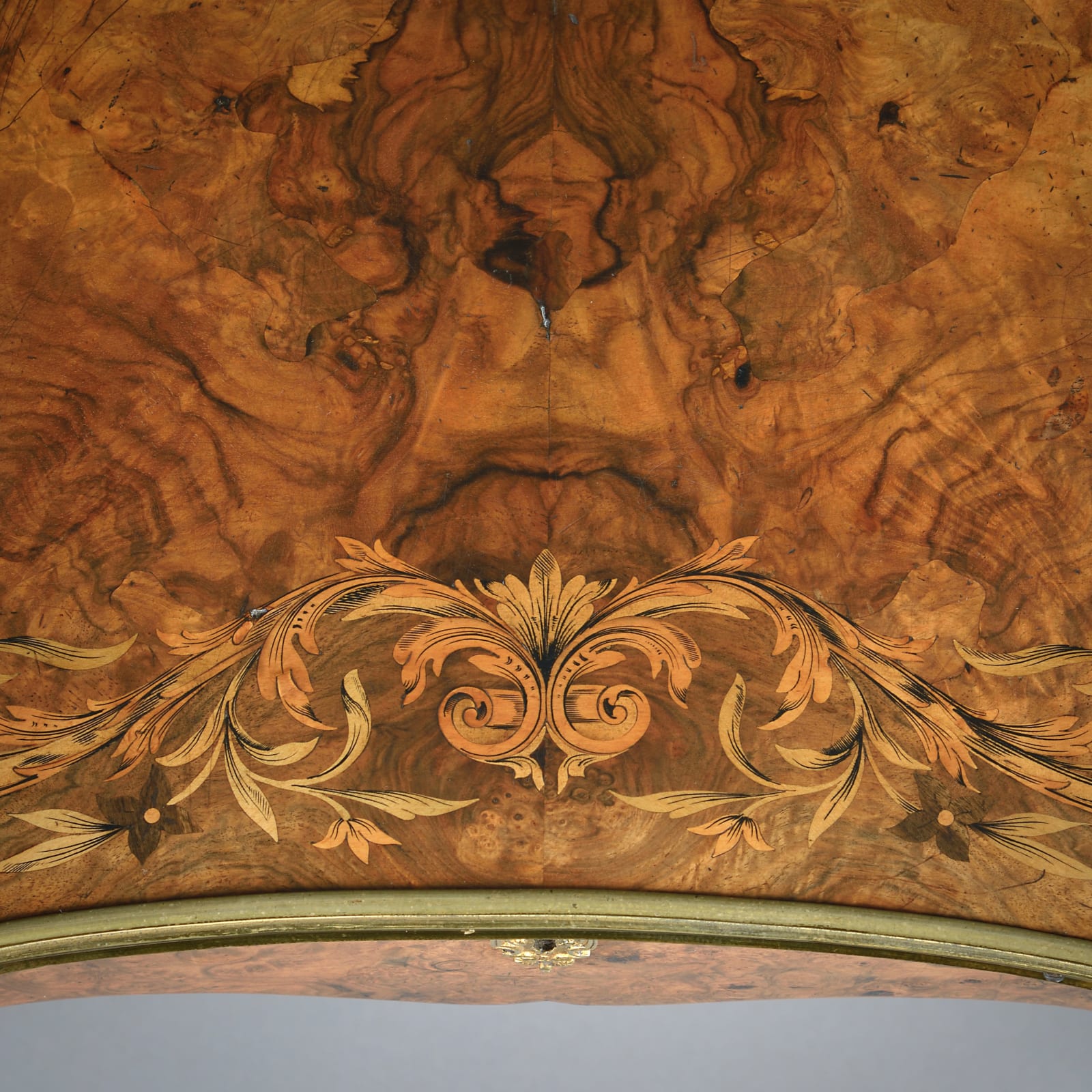 EARLY VICTORIAN ORMOLU-MOUNTED BURR-WALNUT AND MARQUETRY WRITING-TABLE