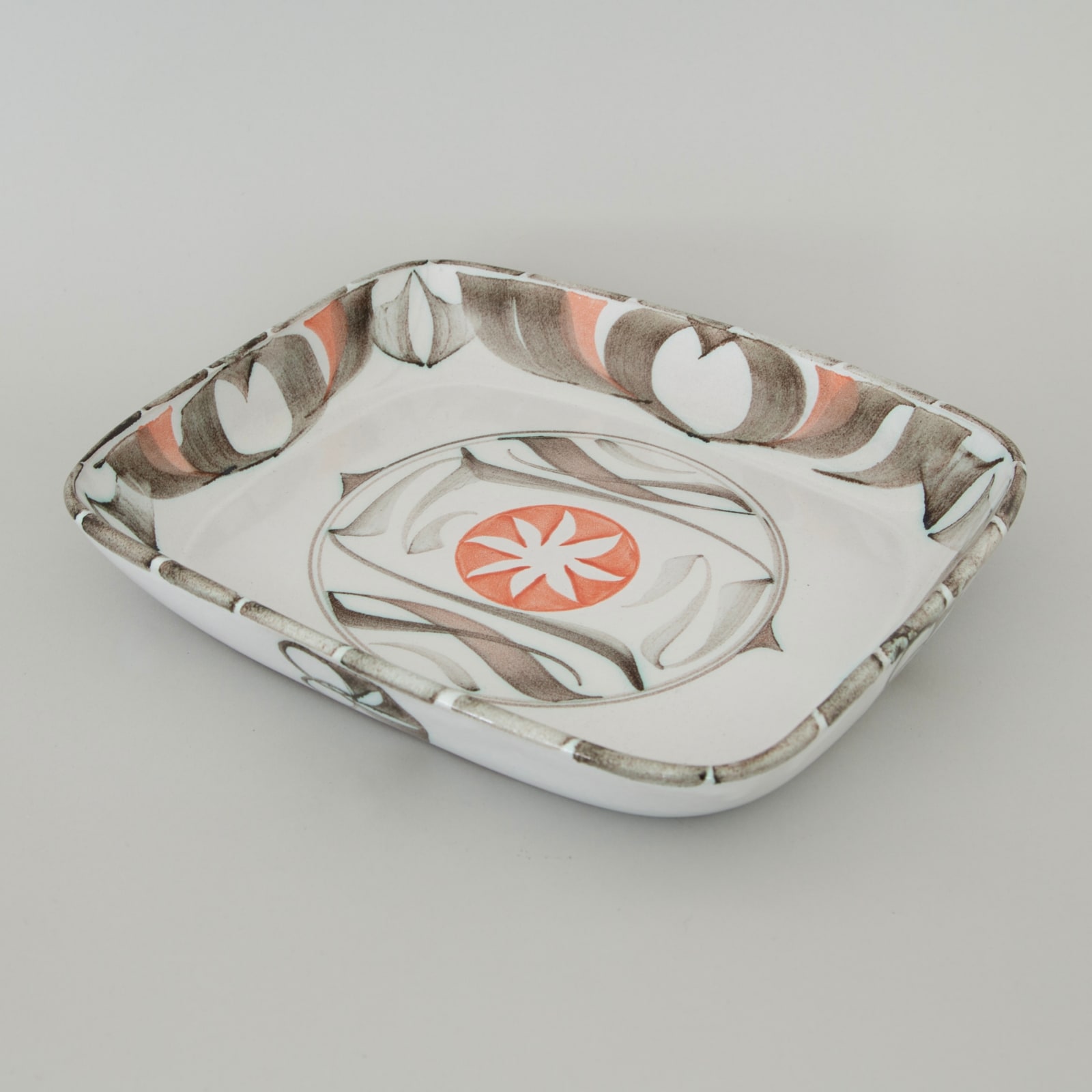 Alan Caiger-Smith, A large Aldermaston Pottery dish with a sun motif