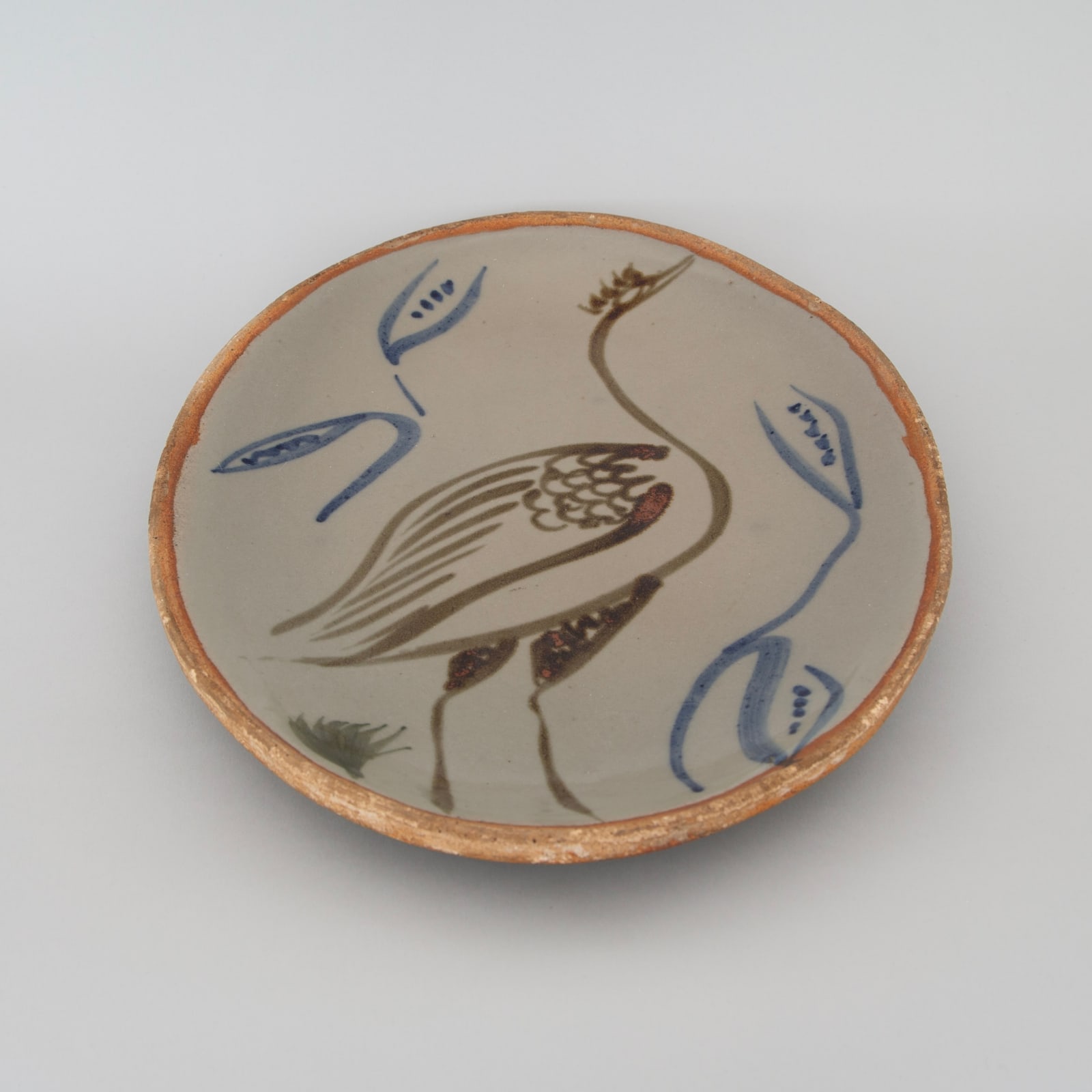 Michael Cardew, Oval plate with a heron motif, 1950s, circa