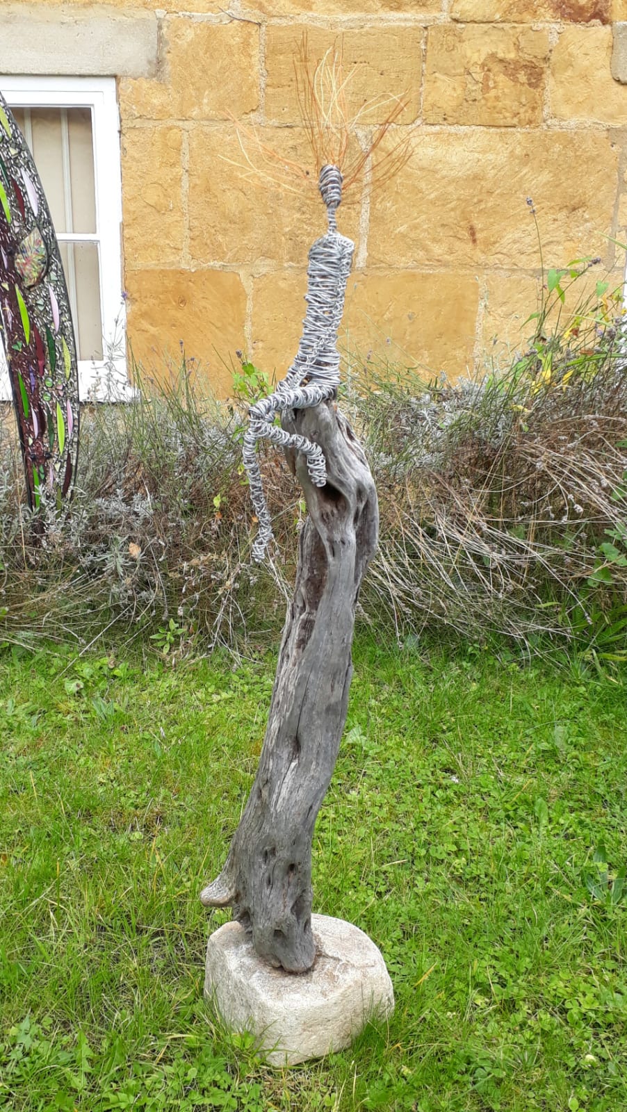 Rachel Ducker, Small seated figure on wood