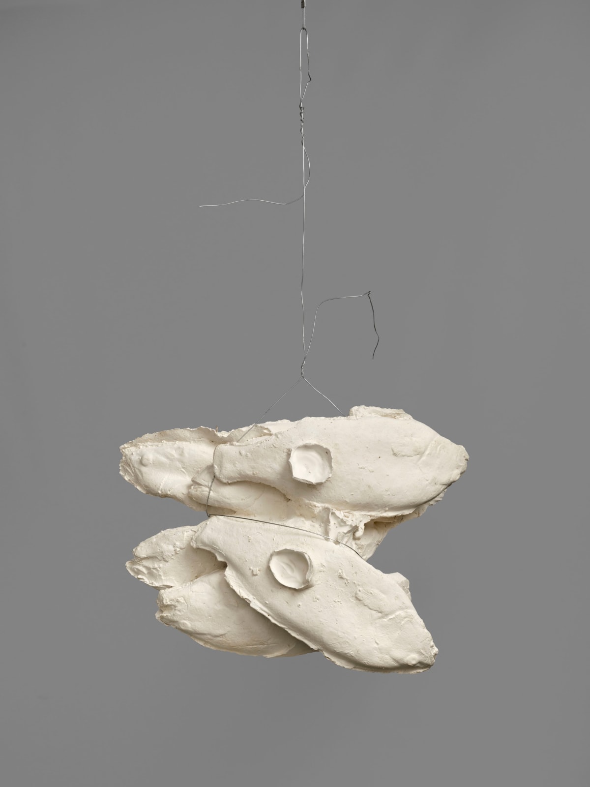 Bruce Nauman, 6 or 7 cast plaster from bundled damaged or rat chewn wax fish, 2024