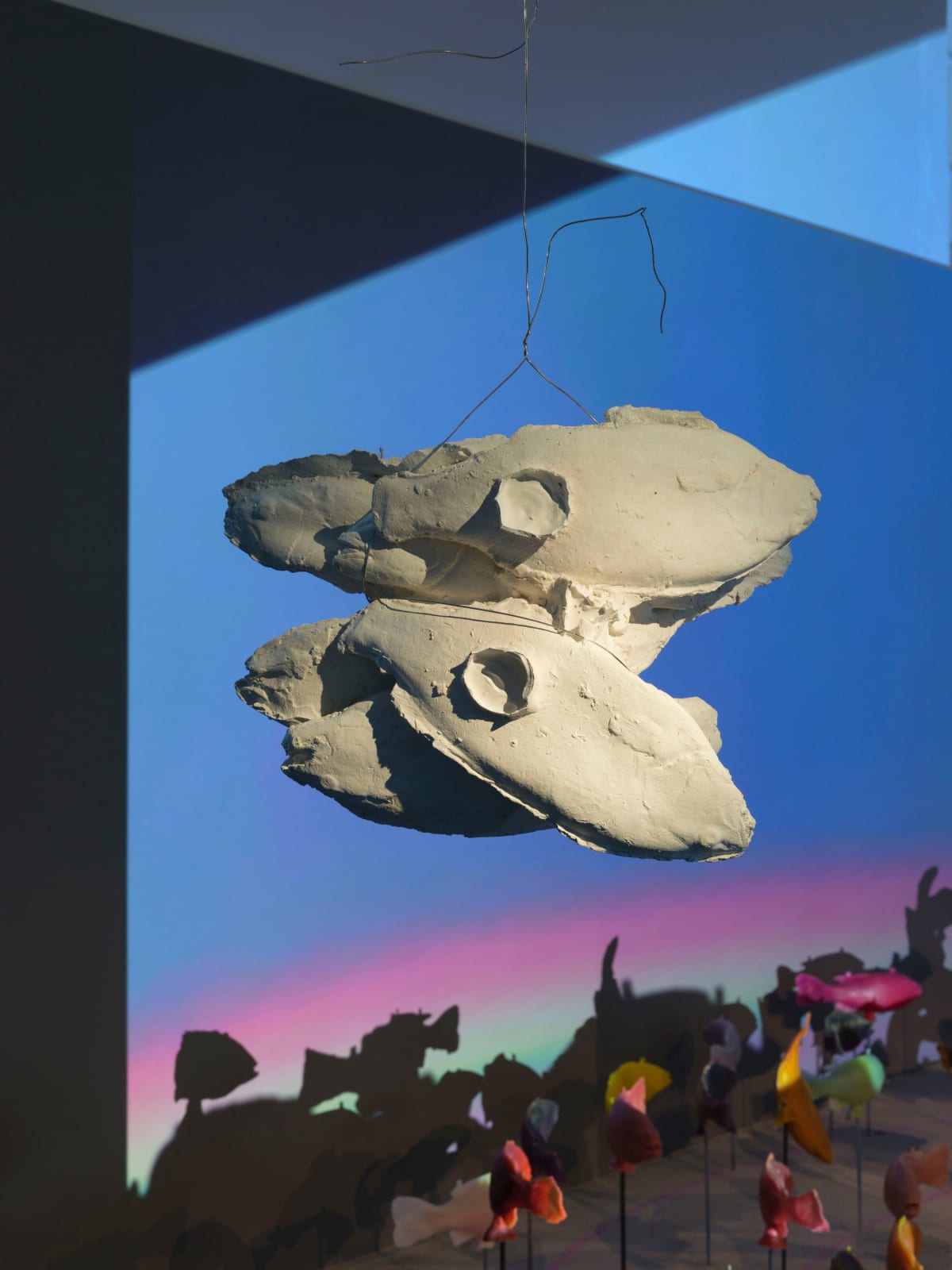 Bruce Nauman, 6 or 7 cast plaster from bundled damaged or rat chewn wax fish, 2024