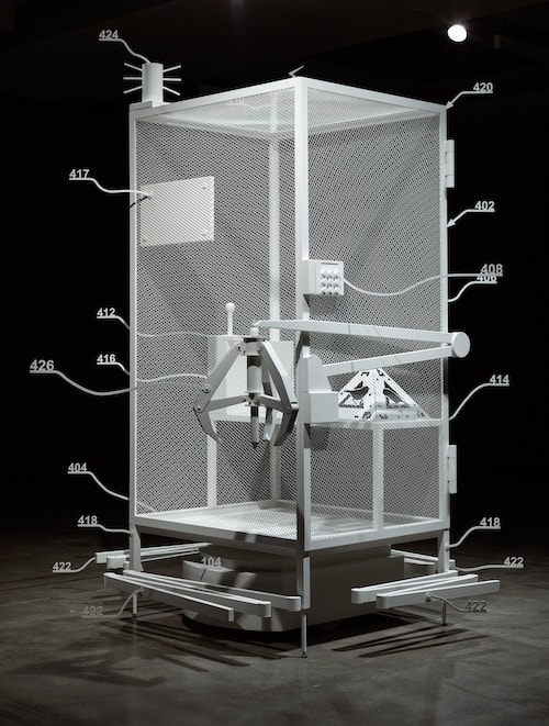 Simon Denny, Amazon worker cage patent drawing as virtual King Island Brown Thornbill cage (US 9,280,157 B2: “System and method for transporting personnel within an active workspace”, 2016), 2016