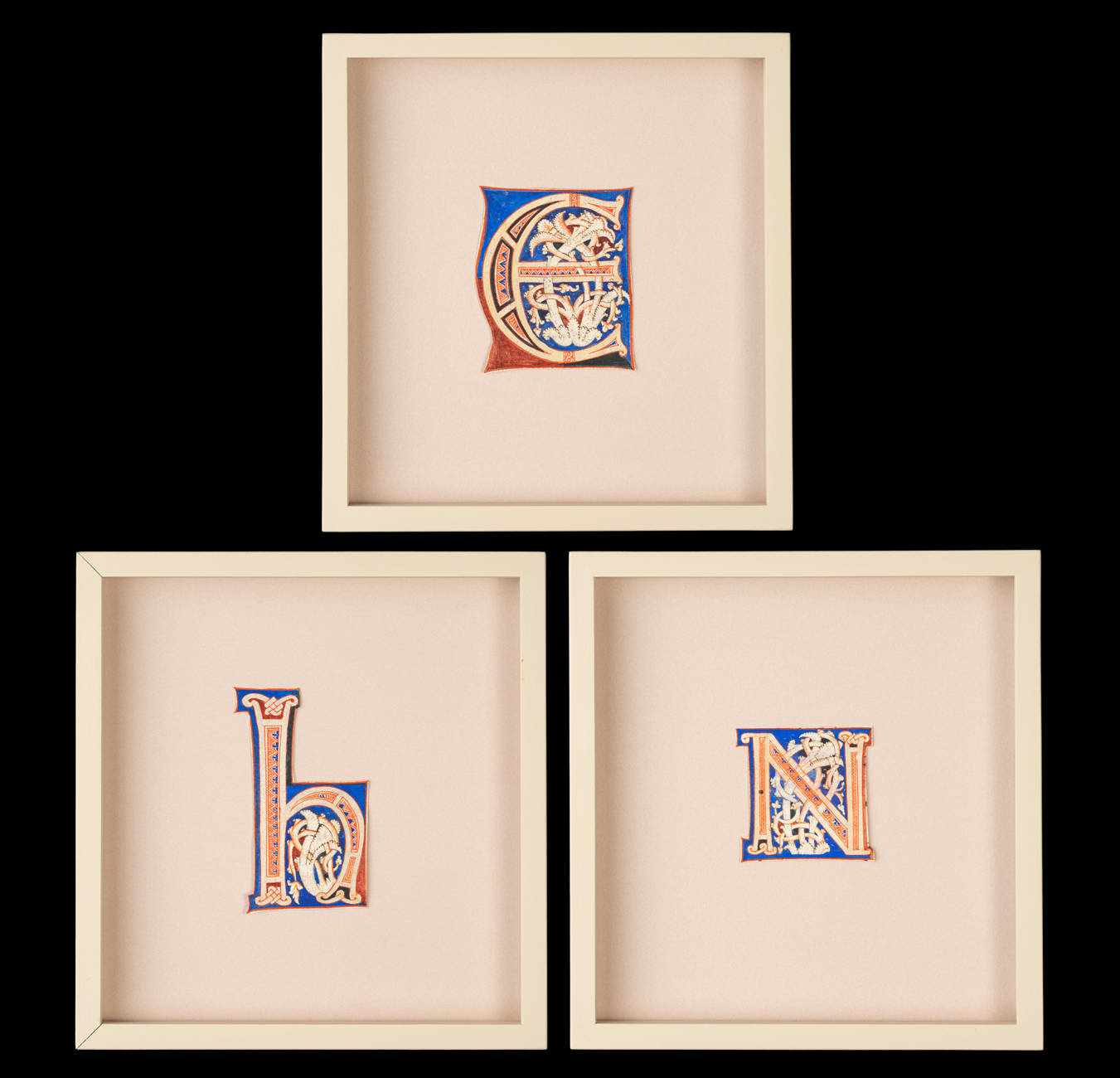 Colorful illuminated iniaitls E, H and N from an Atlantic Bible realized in Tuscany c. 1175.