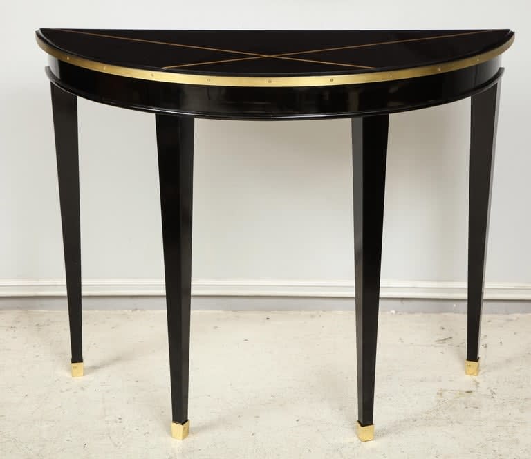 Custom Pair of Ebonized Demilune Consoles with Inlaid Brass Top