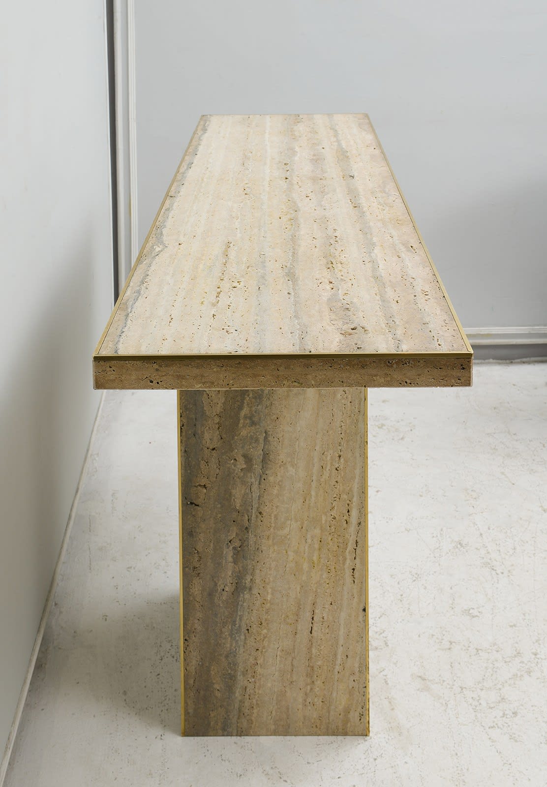 Sculptural Pair of Contemporary Italian Travertine Consoles with Brass Banding, 21st century