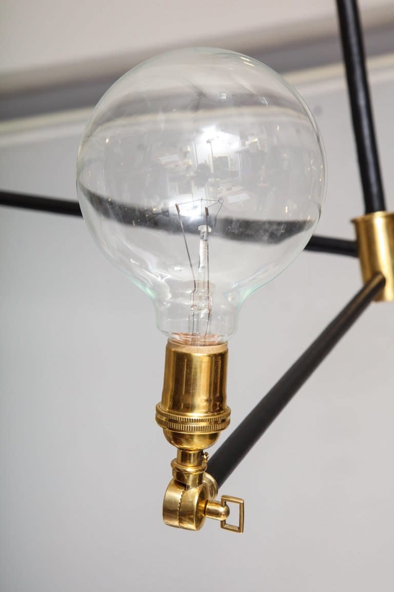 Custom Sculptural Leather and Brass Four-Arm Fixture with Articulating Arms