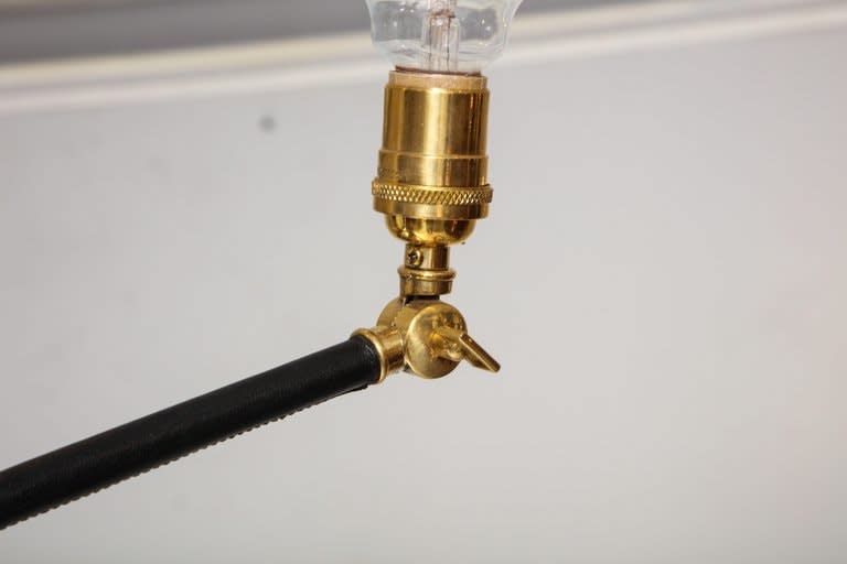 Custom Sculptural Leather and Brass Four-Arm Fixture with Articulating Arms