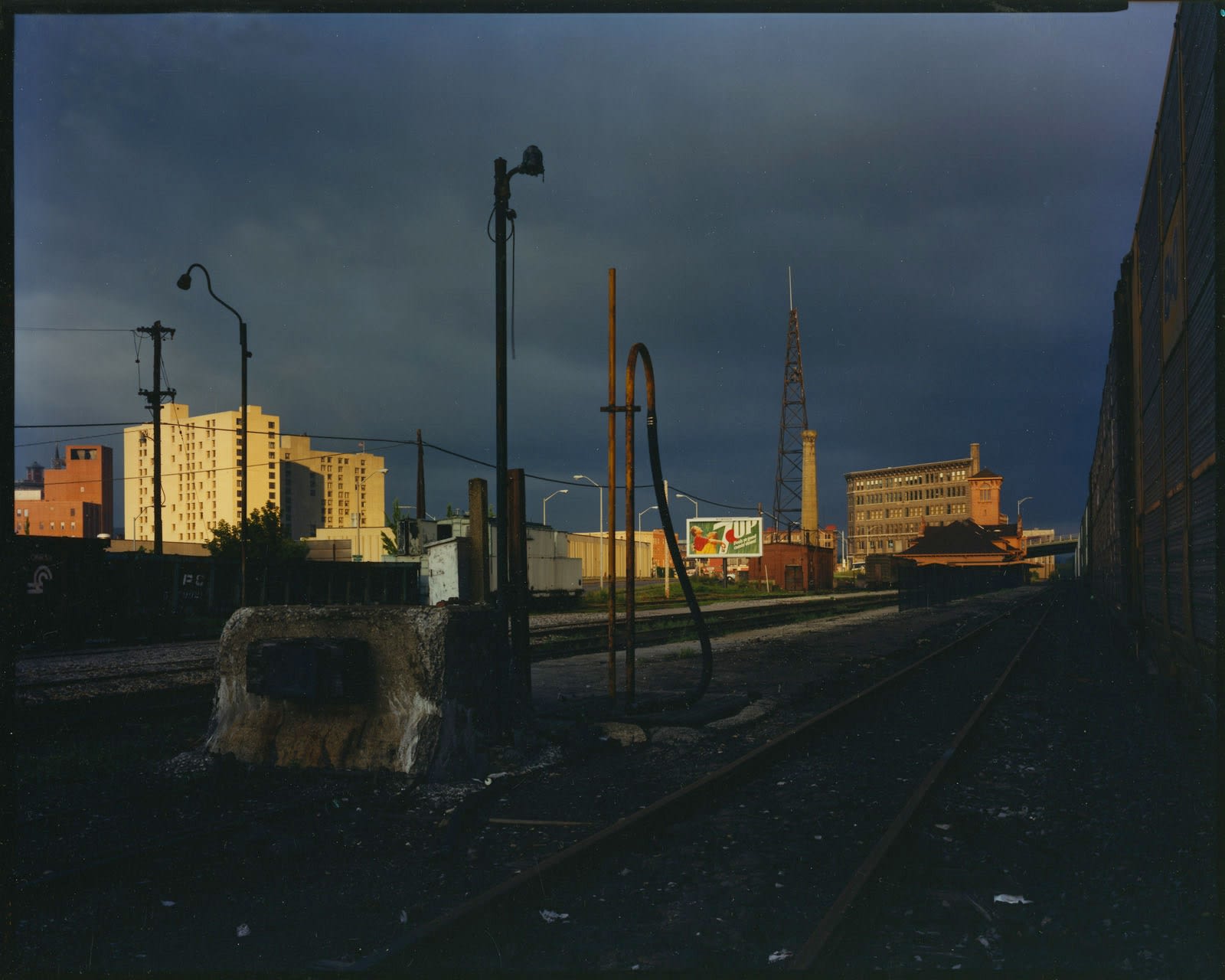 Bruce Wrighton, Dark sky, Buildings in glowing light, 7-Up sign