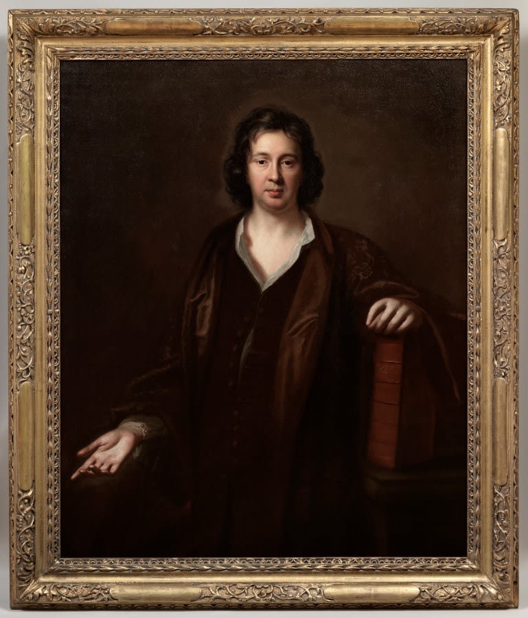 Mary Beale, Portrait of the artist's husband Charles Beale (1632-1705), dressed in an open-necked shirt with brown gown, his left hand resting on a large folio book which stands on a table