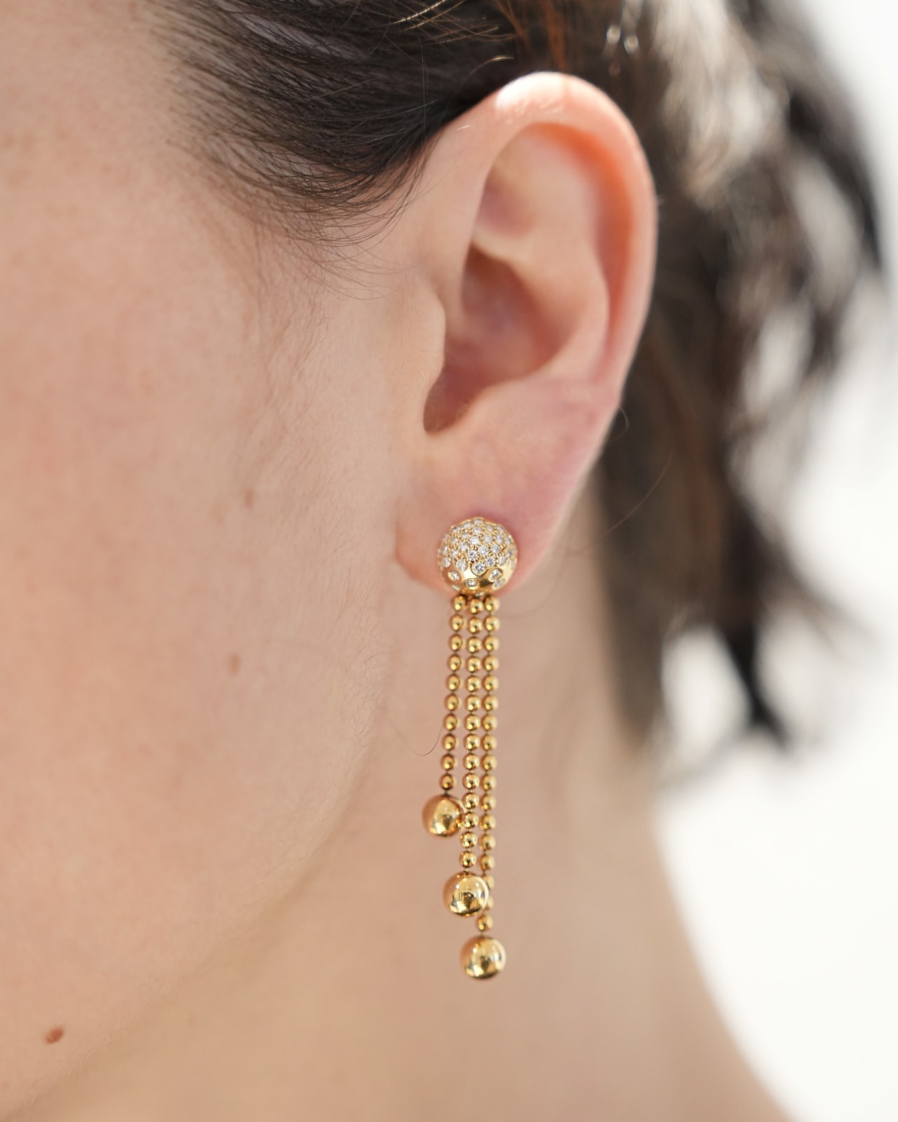 Cartier, A diamond 'Perruque' earring suite, 1999